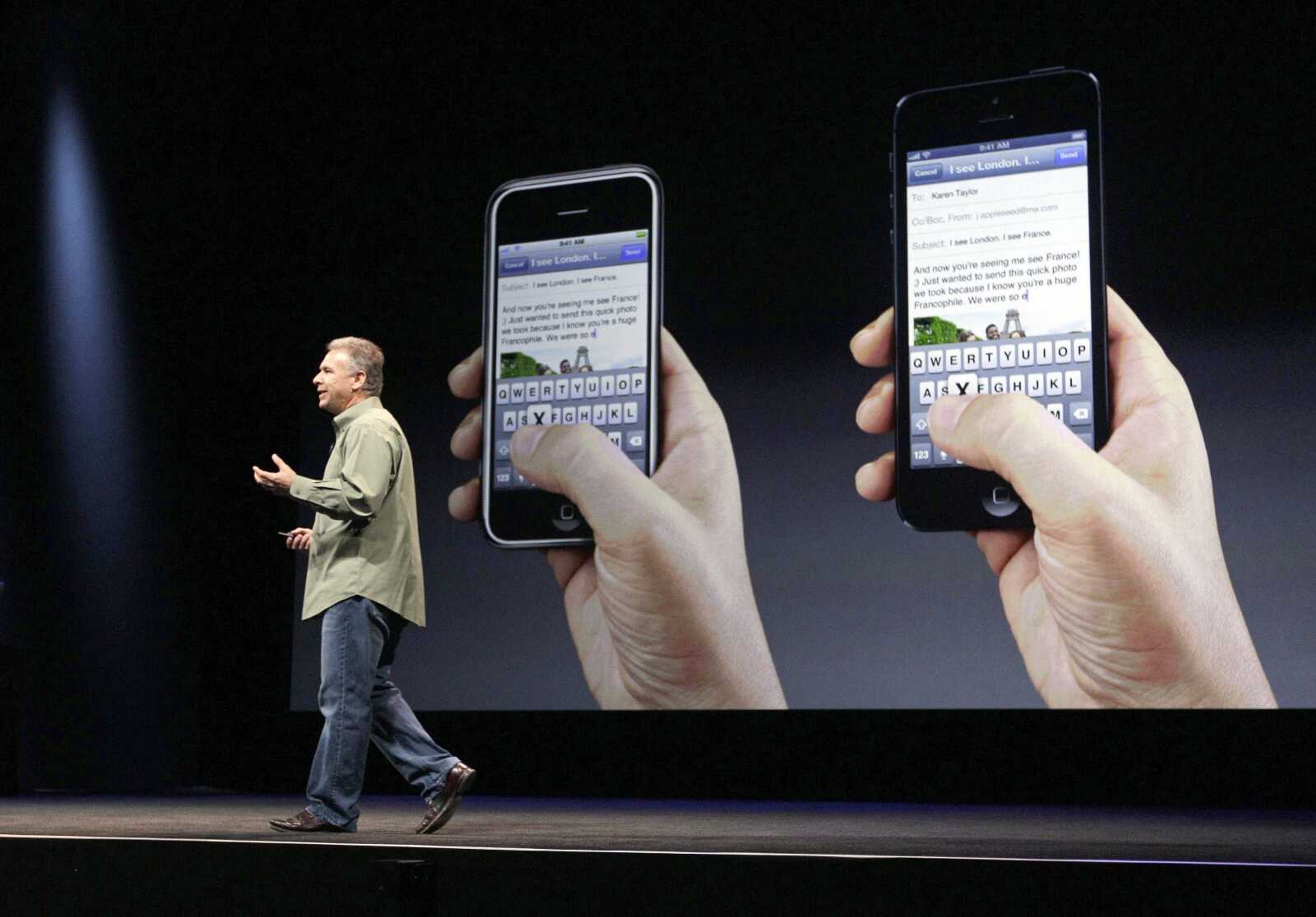 Phil Schiller, Apple's senior vice president of worldwide marketing, speaks on stage during an introduction of the new iPhone 5 on Wednesday at an Apple event in San Francisco. 
(Eric Risberg ~ Associated Press)