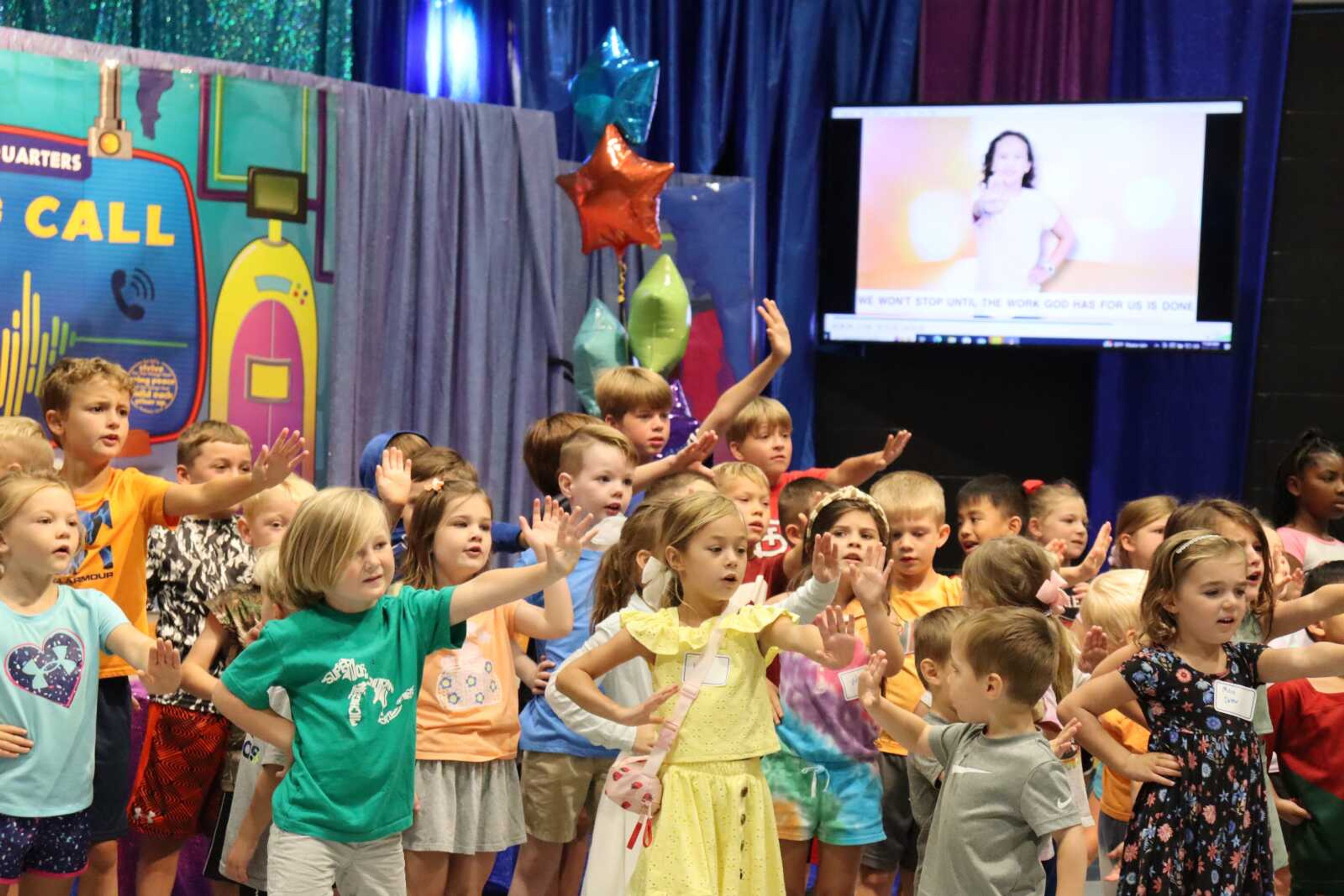 Children sing at the end of Centenary Methodist Church's Hero Hotline vacation Bible school Thursday, July 20. The vacation Bible school brought together 90 children and 40 adult leaders for the program.