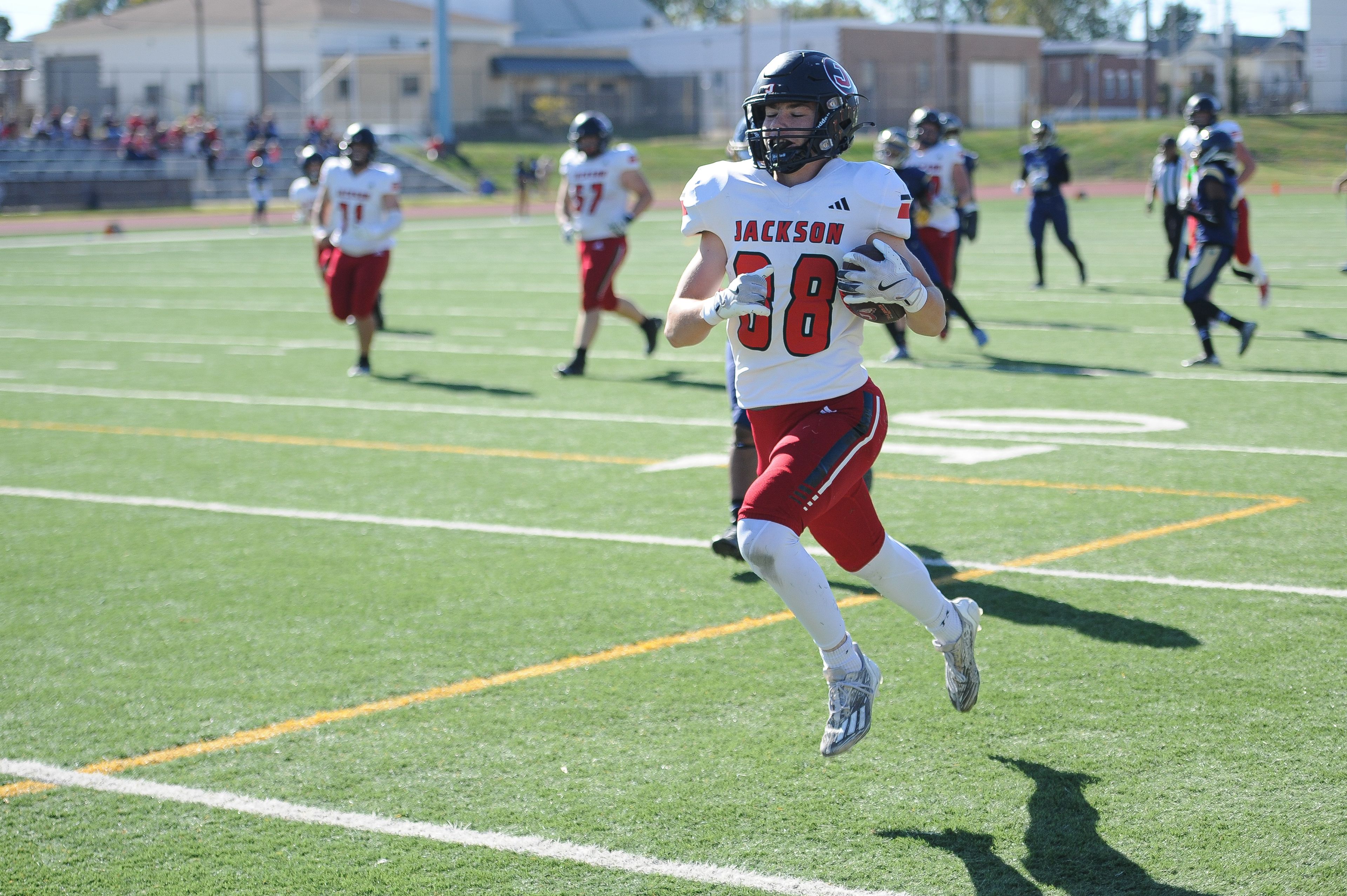 Jackson's Jory Thoma leaps into the end zone during a Saturday, October 19, 2024 game between the Miller Career/Vashon Phoenix and the Jackson Indians at Gateway STEM High School in St. Louis. Jackson defeated Miller Career, 55-14.