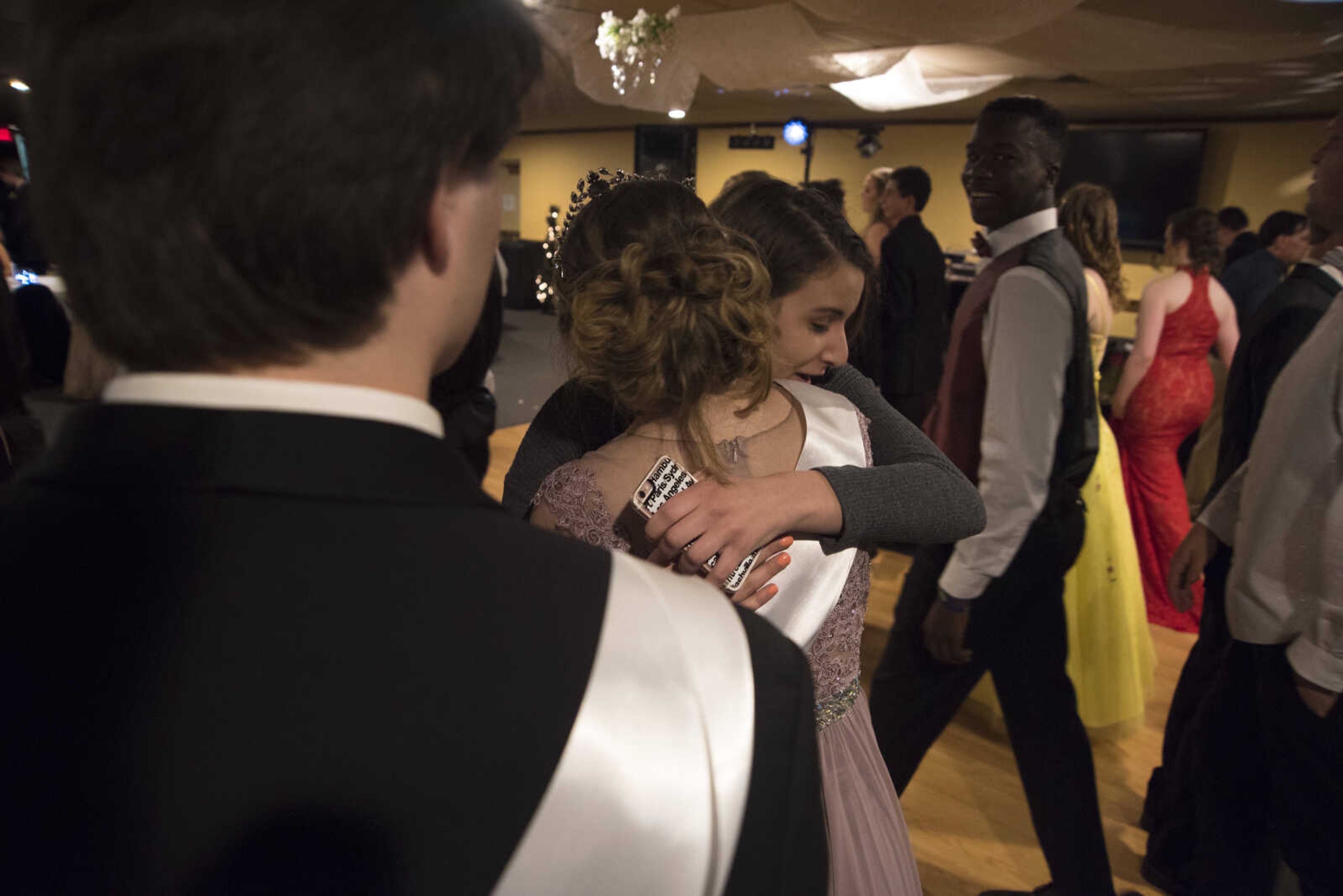 Emily Weber is congratulated on becoming prom queen during the Saxony Lutheran prom Saturday, April 22, 2017 at the Elk's Lodge in Cape Girardeau.