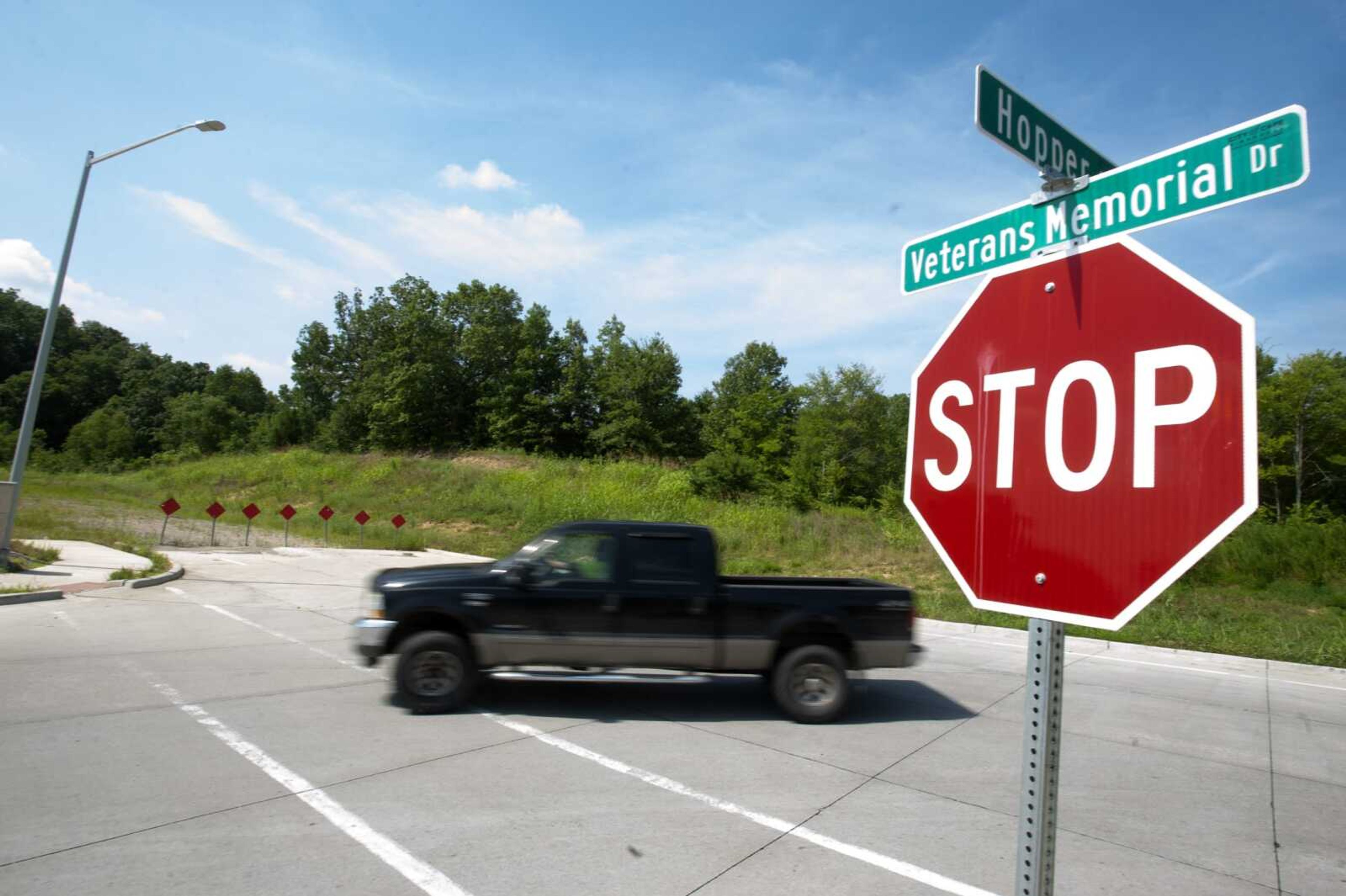 A truck turns onto Hopper Road coming from Veterans Memorial Drive on Monday in Cape Girardeau.