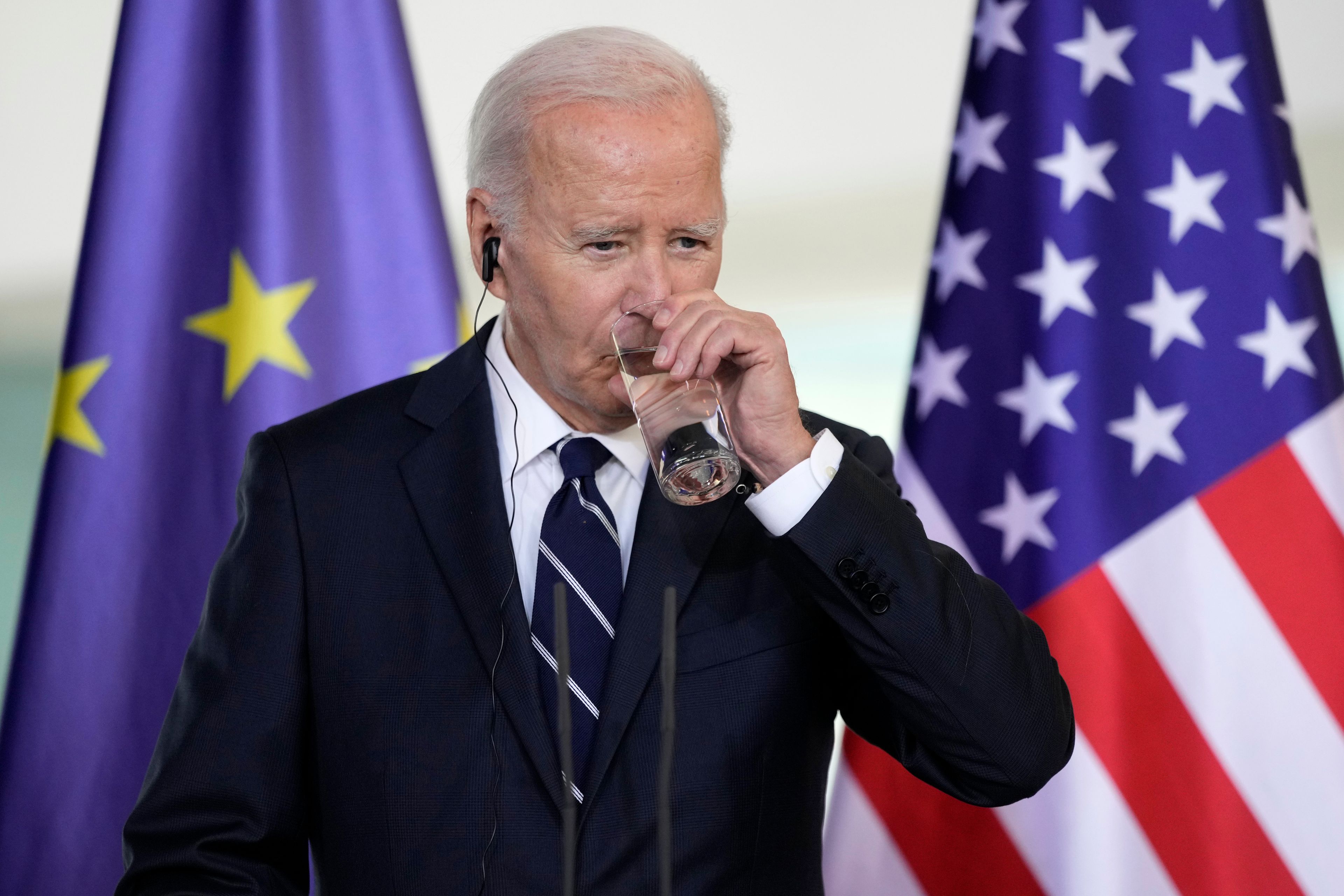 President Joe Biden takes a sip of water before delivering a speech at the Chancellery in Berlin, Germany, Friday, Oct. 18, 2024. (AP Photo/Ben Curtis)