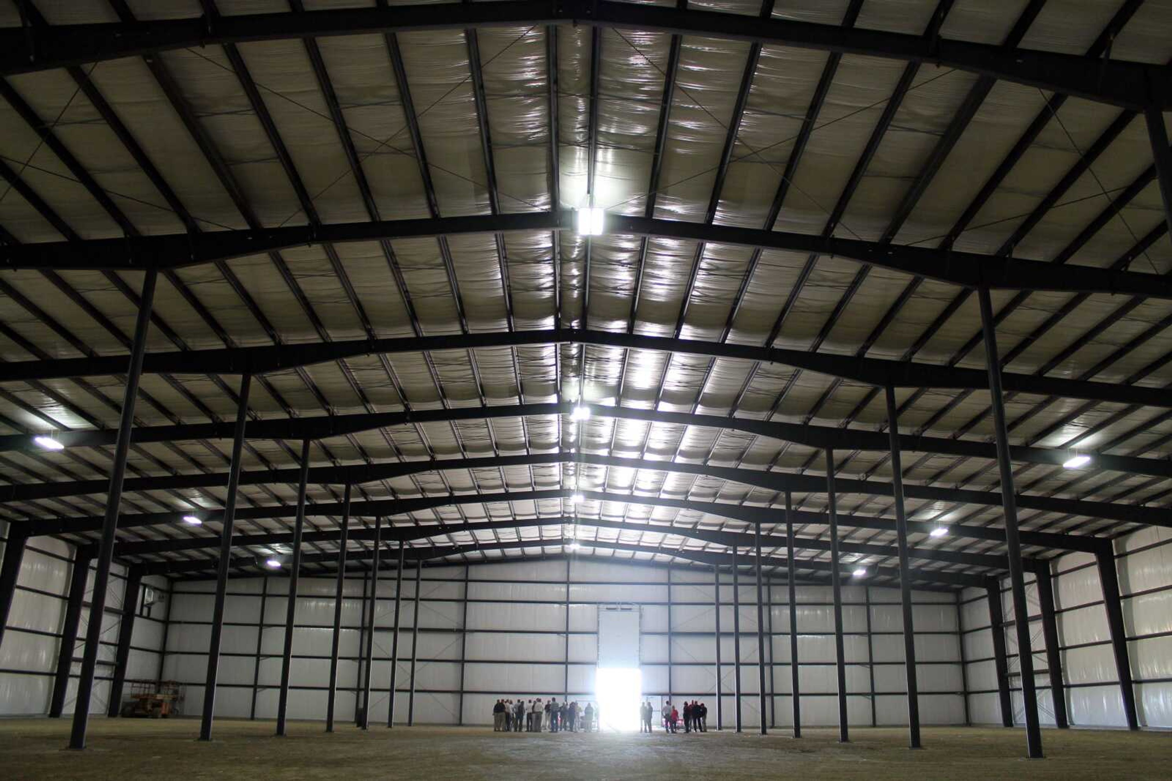 Jackson officials and residents tour Jackson Industrial Development Company's new speculative building during an open house Tuesday.