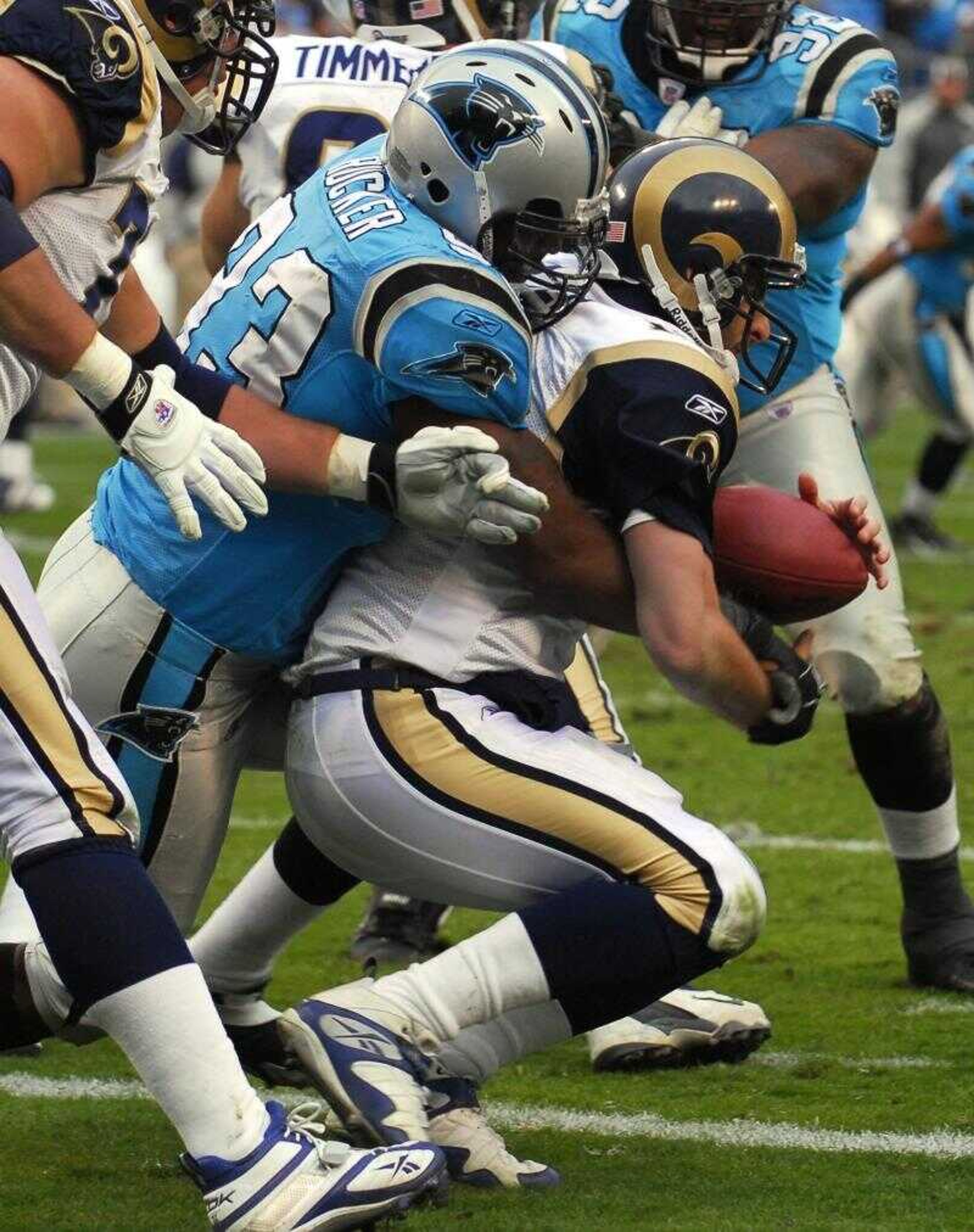 Panthers lineman Mike Rucker sacked Rams quarterback Marc Bulger in the end zone for a safety in the final minutes of the Panthers' 15-0 victory Sunday in Charlotte, N.C. (MIKE MCCARN ~ Associated Press)