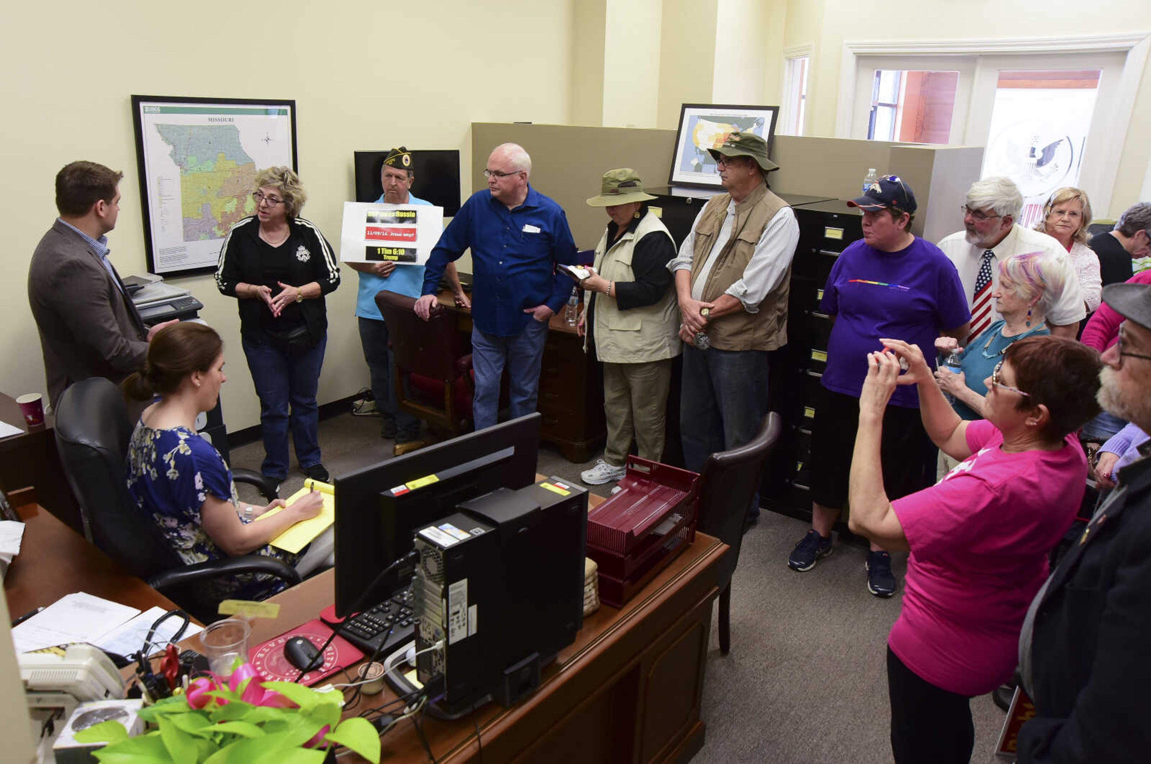 People bring up concerns they have with District Director, Darren Lingle, for Senator Roy Blunt in U.S. Sen. Roy Blunt's office Wednesday, Feb. 22, 2017 in Cape Girardeau.