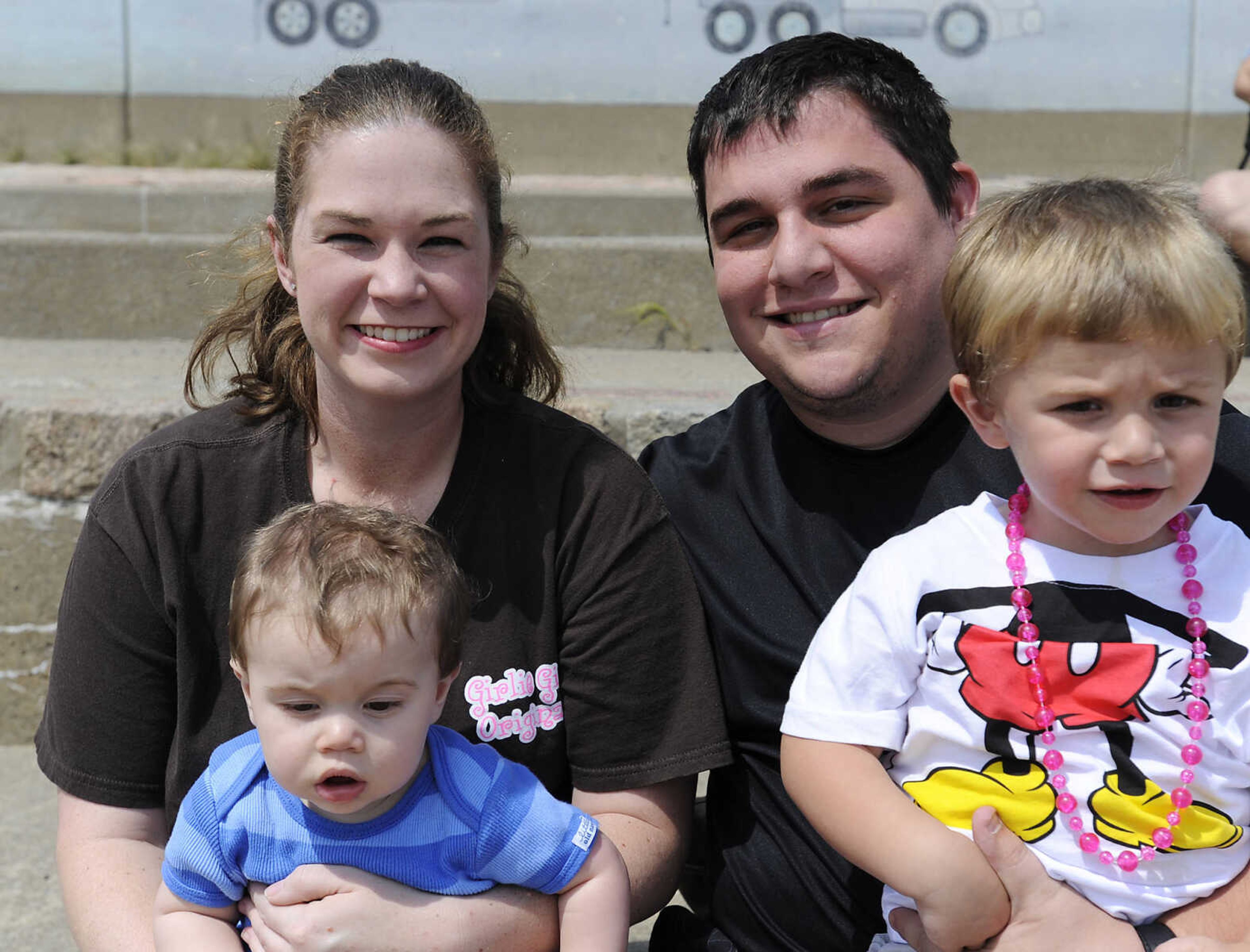 Tyler, right, and Moretta Burk with nine month-old Hayden and two year-old Bryce Saturday, Aug. 17, at Riverfront Park in Cape Girardeau.