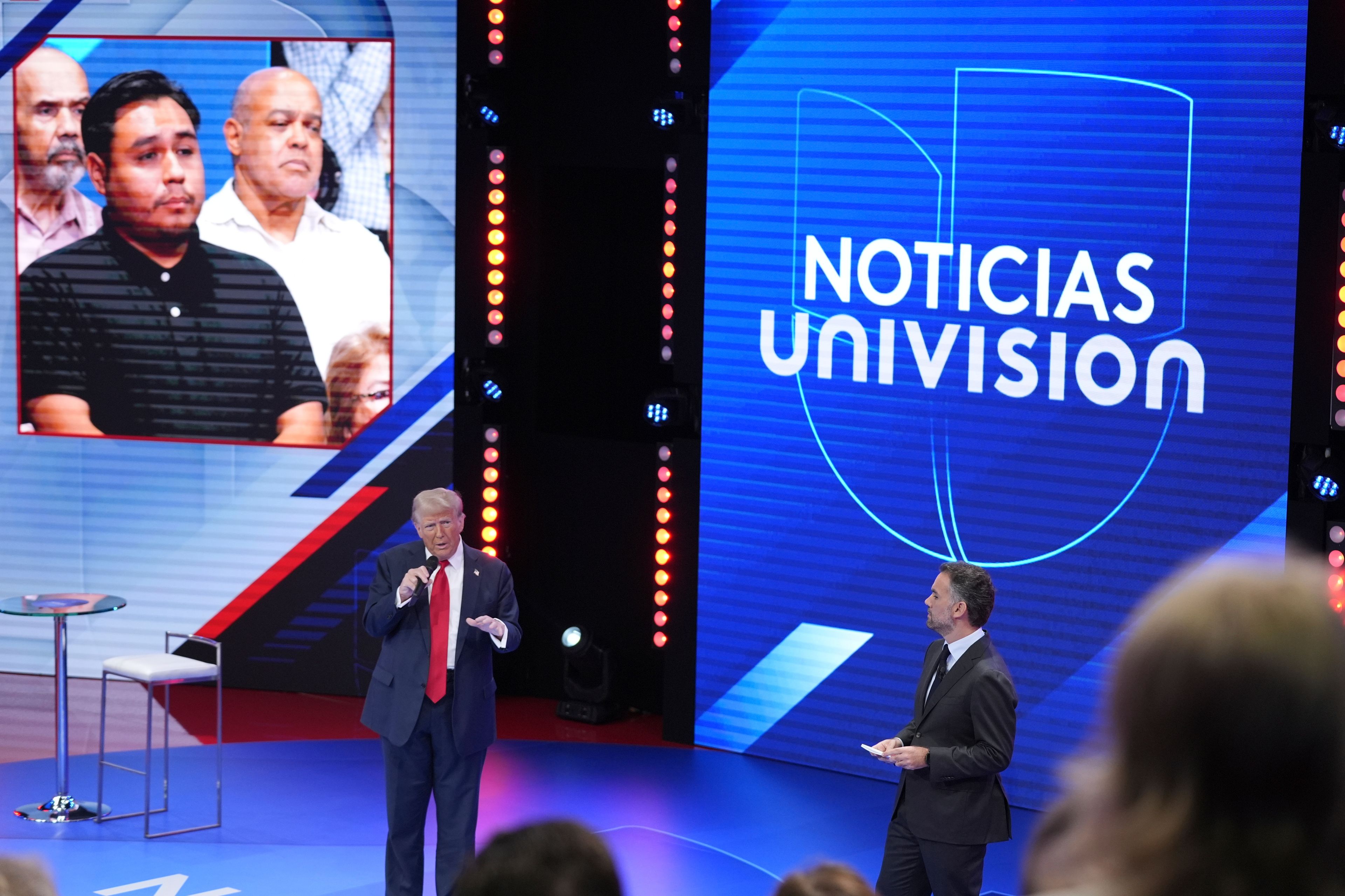 Republican presidential nominee former President Donald Trump speaks during a Univision town hall, Wednesday, Oct. 16, 2024, in Doral, Fla., with Televisa's Enrique Acevedo. (AP Photo/Alex Brandon)