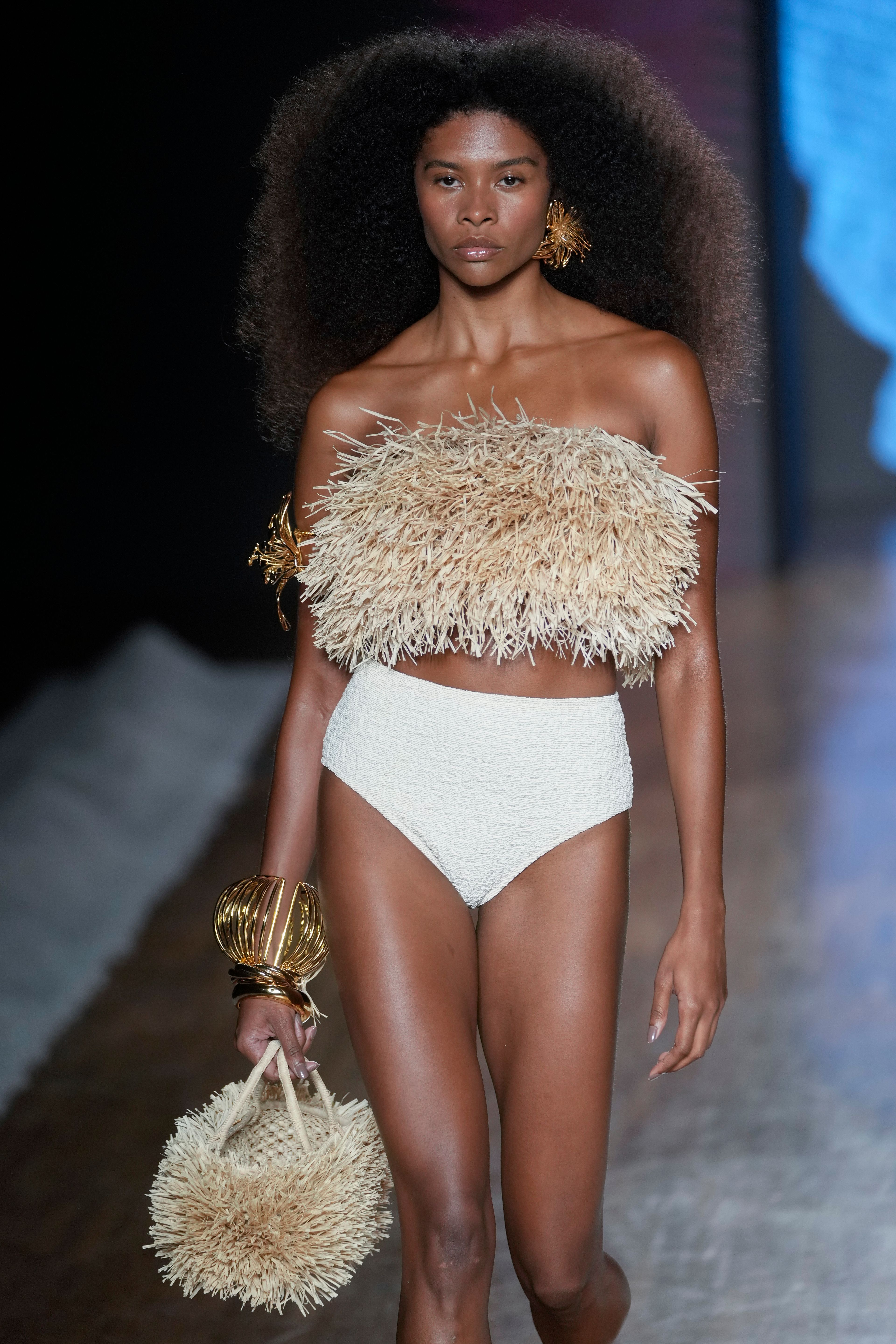 A model wears a creation from the Salinas collection during Sao Paulo Fashion Week in Sao Paulo, Brazil, Thursday, Oct. 17, 2024. (AP Photo/Andre Penner)