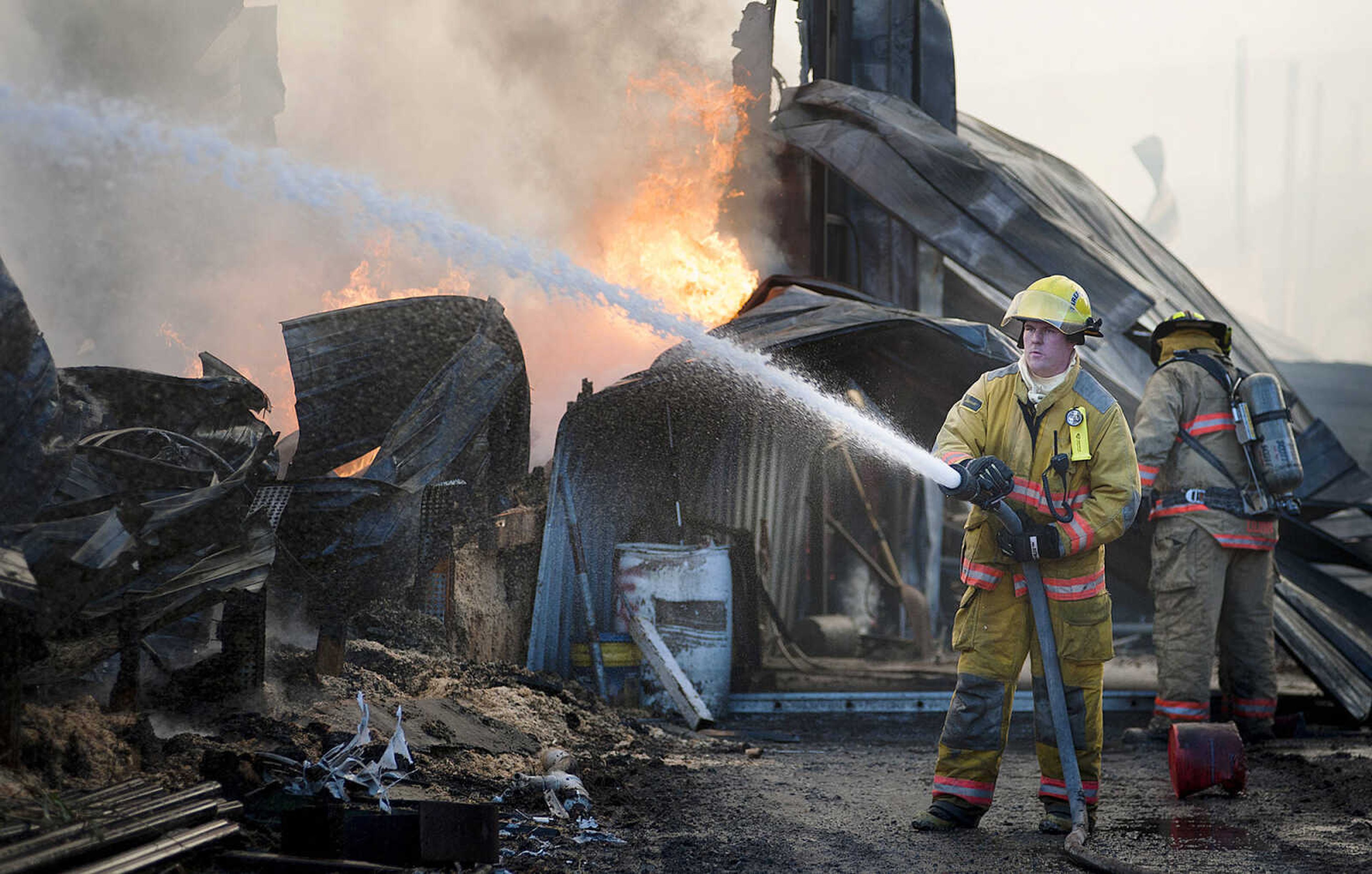 ADAM VOGLER ~ avogler@semissourian.com
Firefighters from at least six area fire departments battled a fire Tuesday, Oct. 8, at Flickerwood Farms Inc, 3027 Larch Lane in Fruitland. No one was injured in the fire which completely destroyed the building that house a baled wood shaving and feed byproduct business.