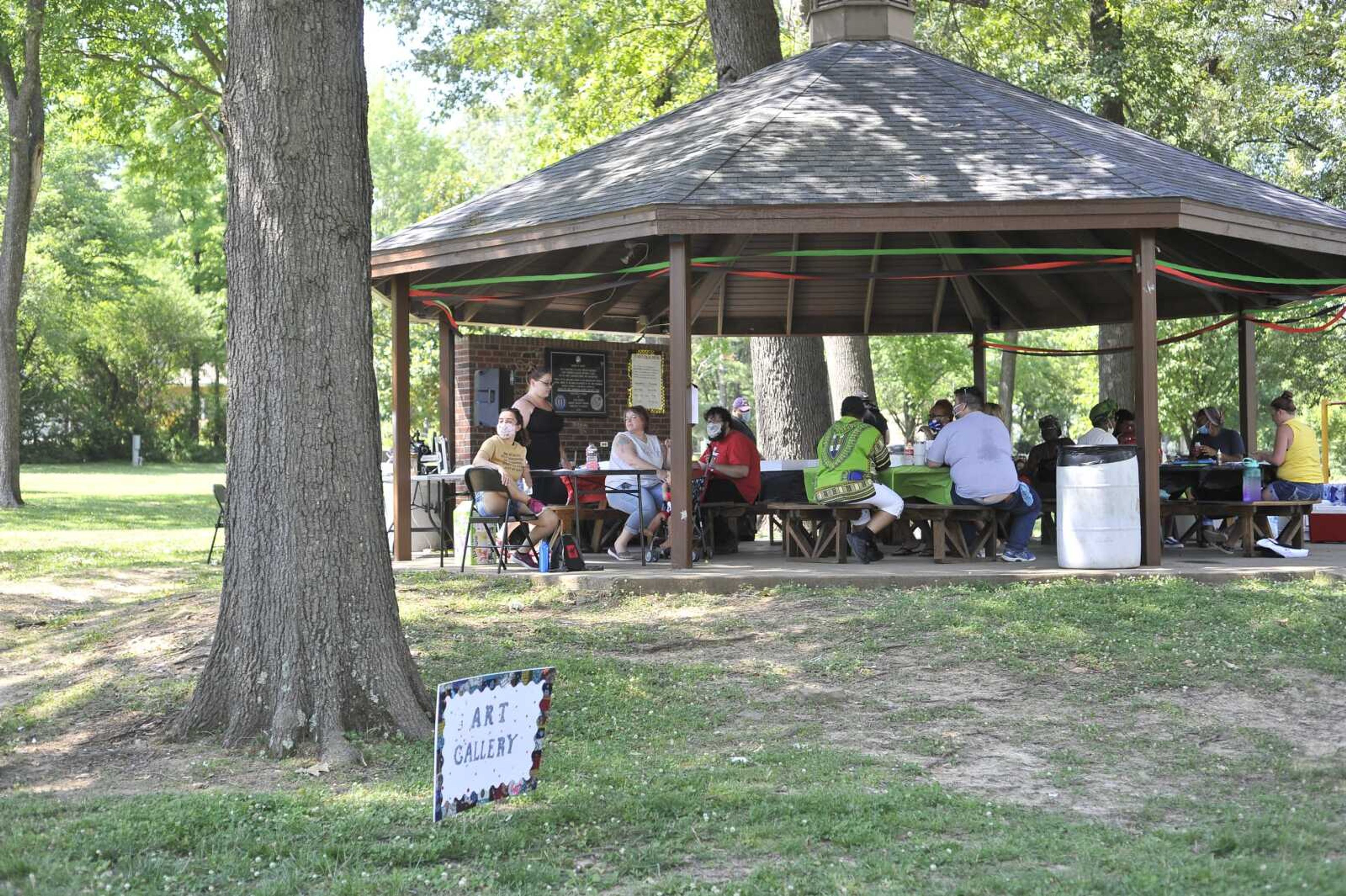 Revelers gather at a park shelter to celebrate Juneteenth on Friday, June 19, 2020, at Arena Park in Cape Girardeau.