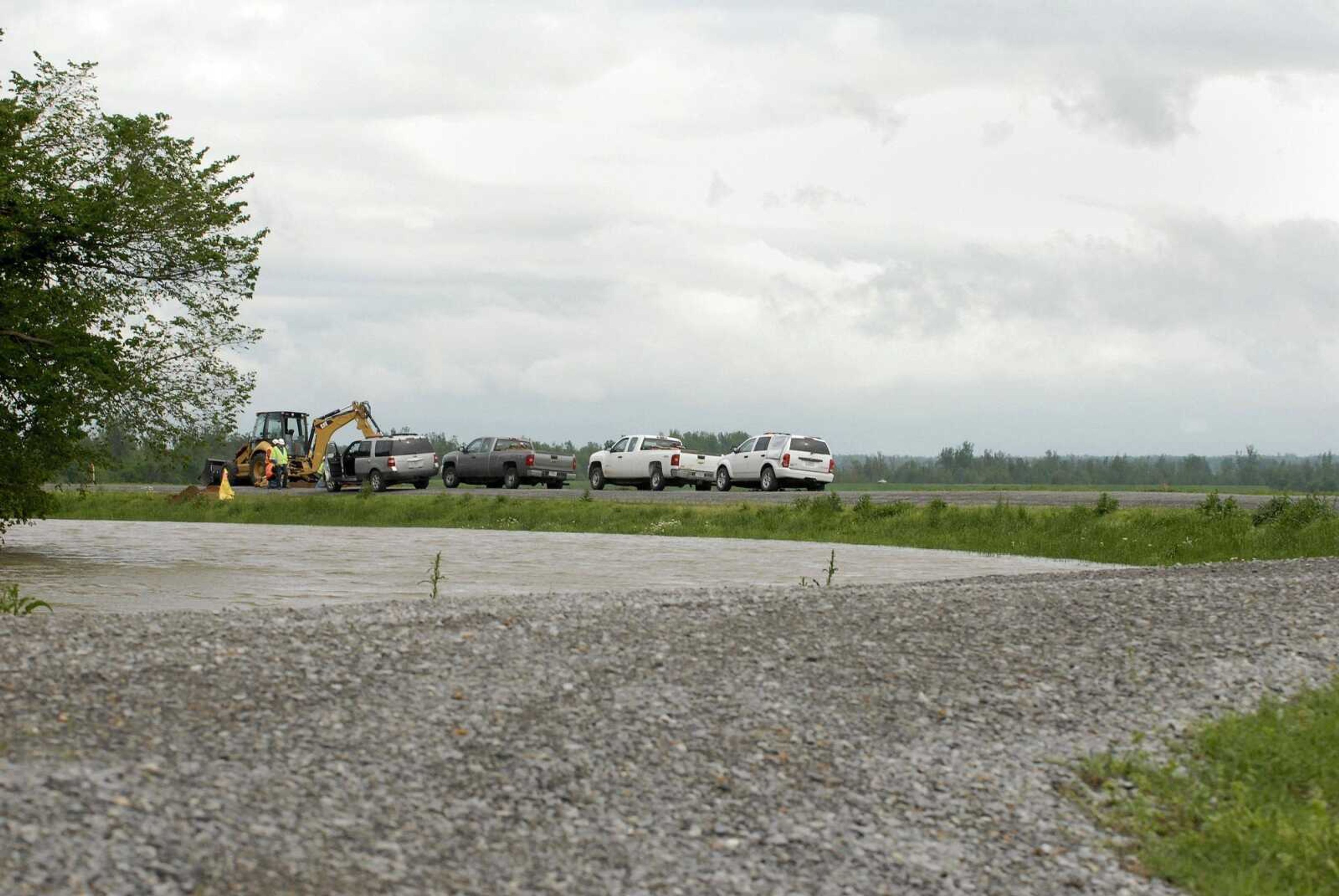 Workers prepare the Birds Point levee in Mississippi County to be intentionally breached Wednesday as debate continues on the best course of action. The U.S. Army Corps of Engineers has said it will decide this weekend. (Laura Simon)