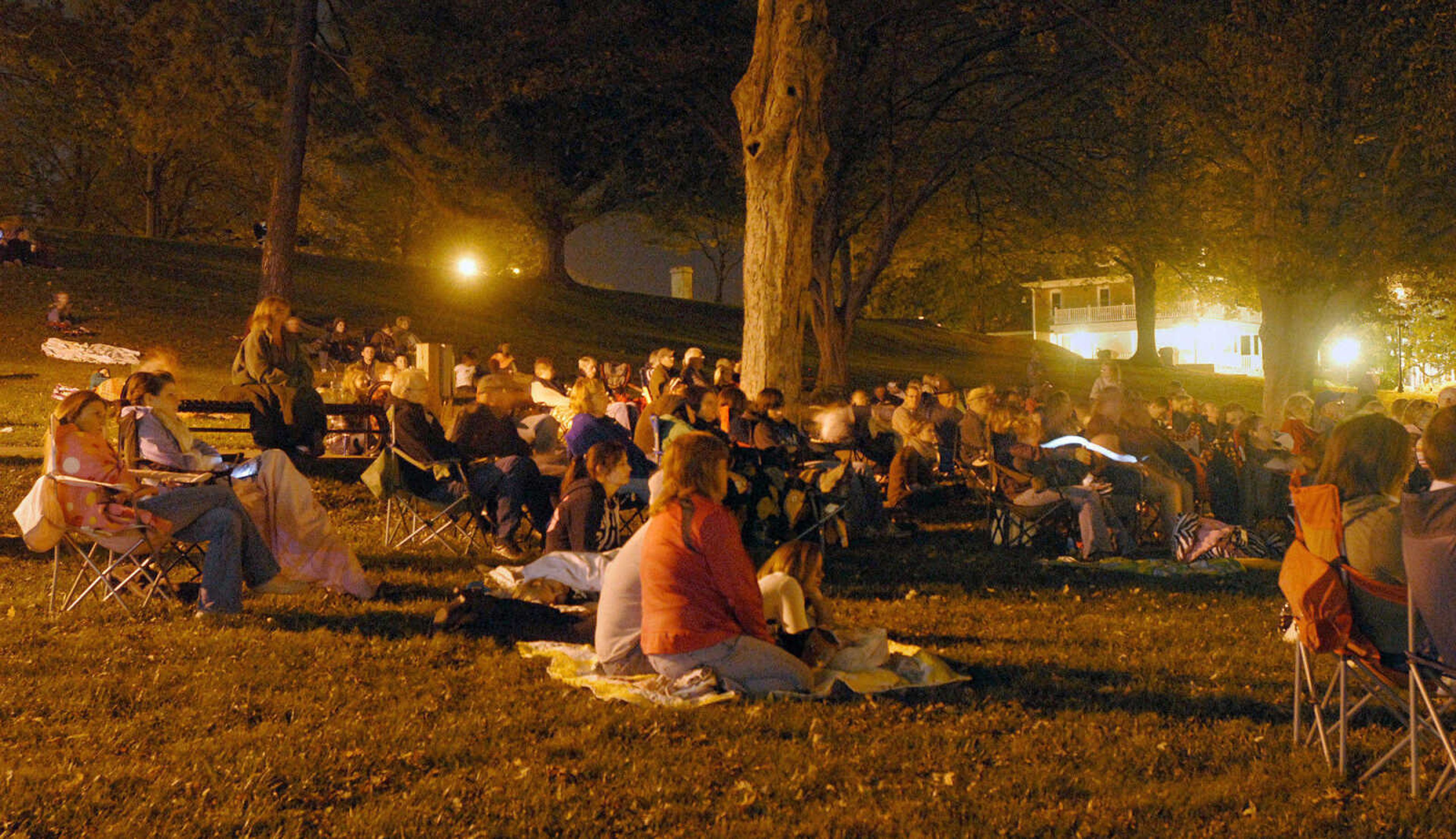 LAURA SIMON ~ lsimon@semissourian.com
The crowd listens to bone chilling tales from story tellers Regina Carpenter and Gayle Ross Friday, October 14, 2011 during an evening of Ghost Storytelling at the east lawn of the River Campus of Southeast Missouri State University in Cape Girardeau.