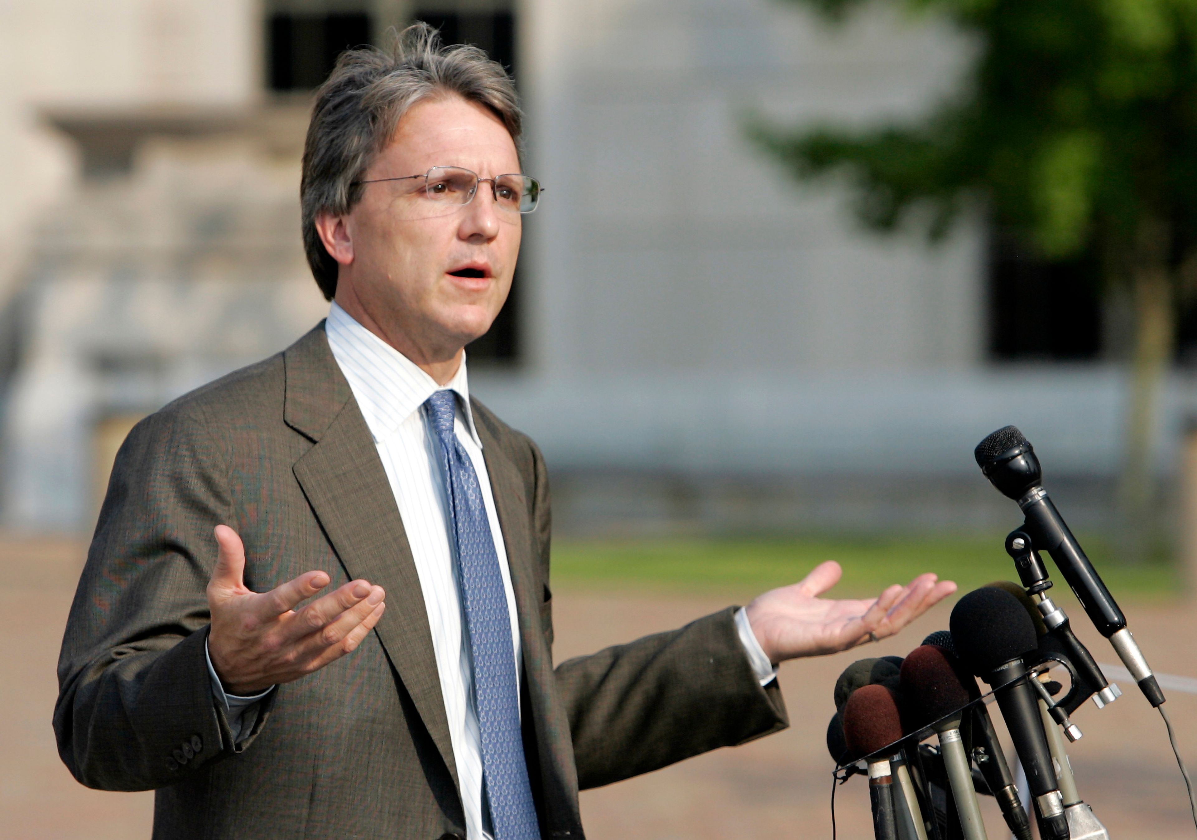 FILE - Paul Hamrick gestures while talking with reporters after the jury in the federal corruption trial against him, as well as former Gov. Don Siegelman, former HealthSouth CEO Richard Scrushy and Mack Roberts reported it was deadlocked on a verdict, June 22, 2006, in Montgomery, Ala. (AP Photo/Rob Carr, File)