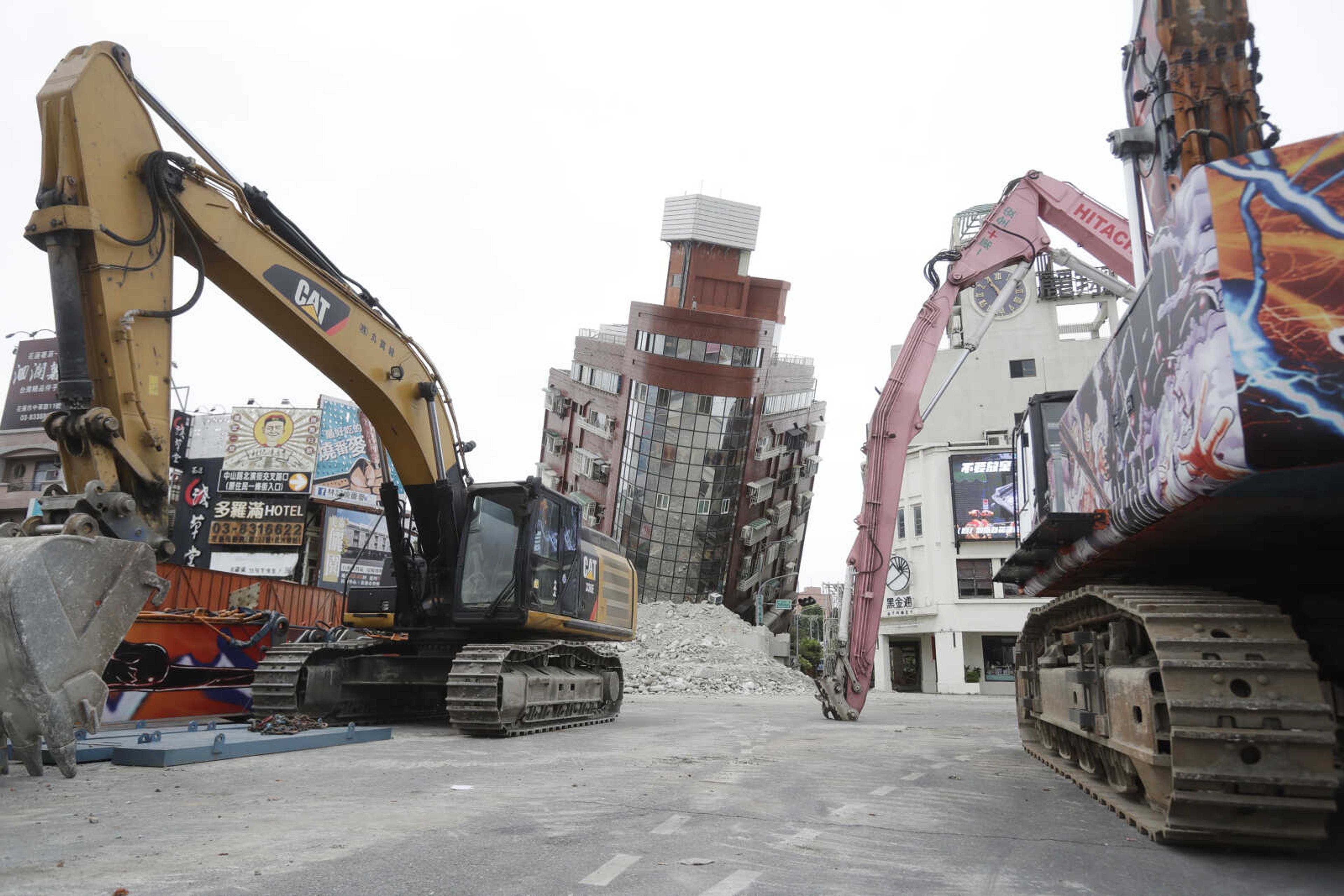 A building is seen partially collapsed, two days after a powerful earthquake struck the city, in Hualien City, eastern Taiwan, Friday, April 5, 2024. Rescuers searched Thursday for missing people and worked to reach hundreds stranded when Taiwan's strongest earthquake in 25 years sent boulders and mud tumbling down mountainsides, blocking roads. (AP Photo/Chiang Ying-ying)