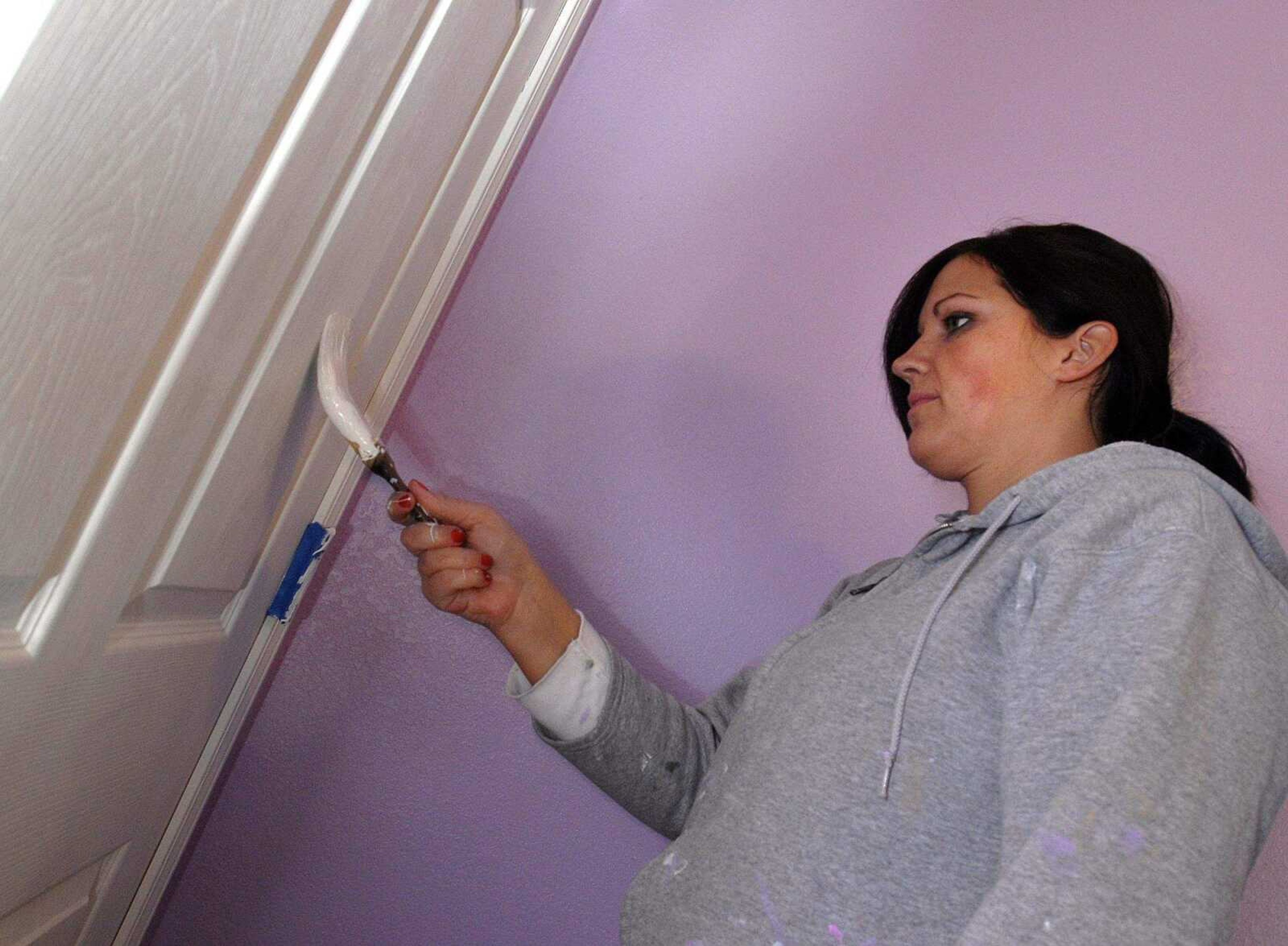 FRED LYNCH ~ flynch@semissourian.com
Sara Taylor works inside her own Habitat for Humanity house Saturday in Cape Girardeau.