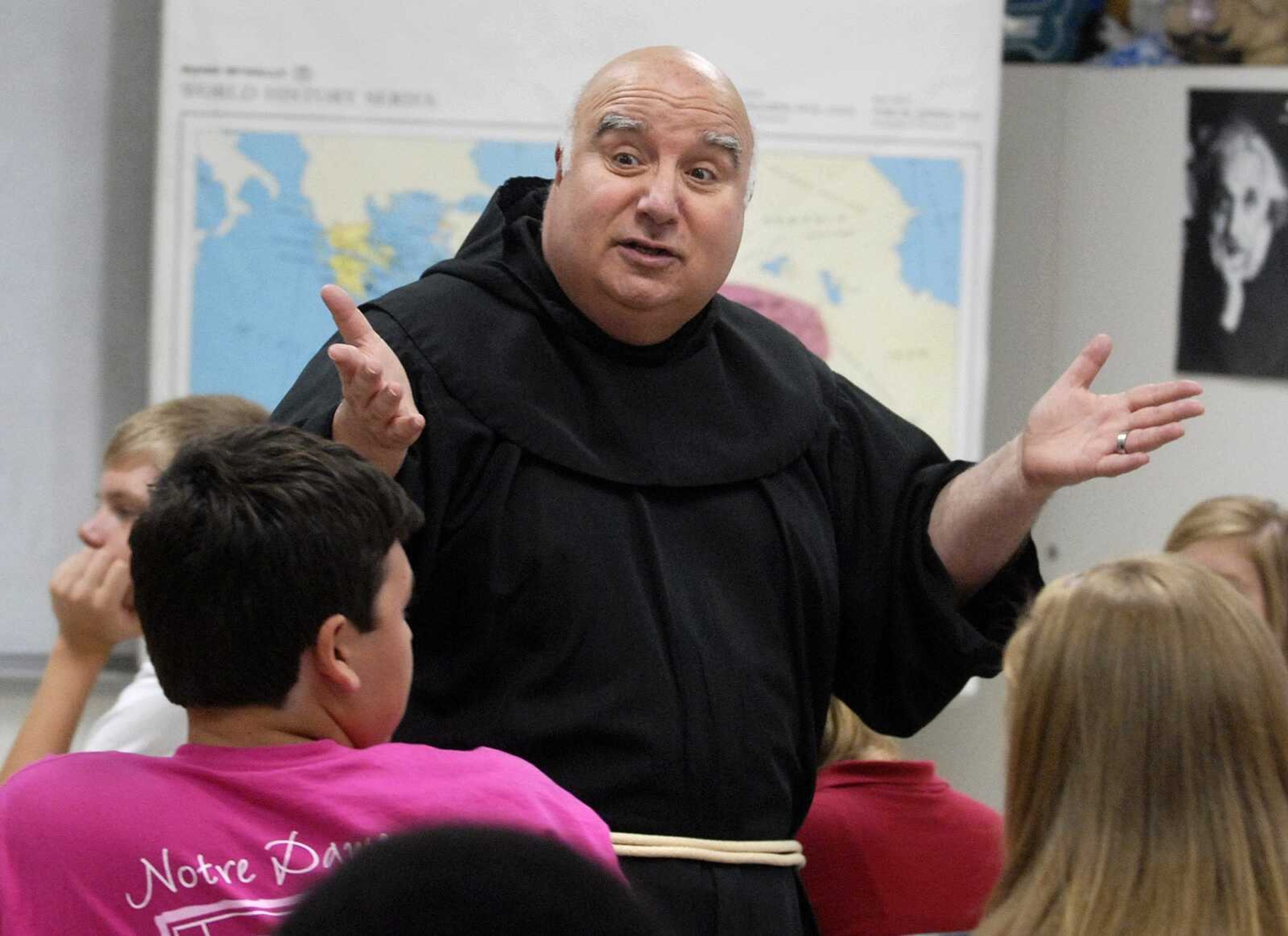 Brother David Anthony Migliorino speaks to his history class about the events of Sept. 11, 2001 Friday, Sept. 9 at Notre Dame Regional High School. (Laura Simon)