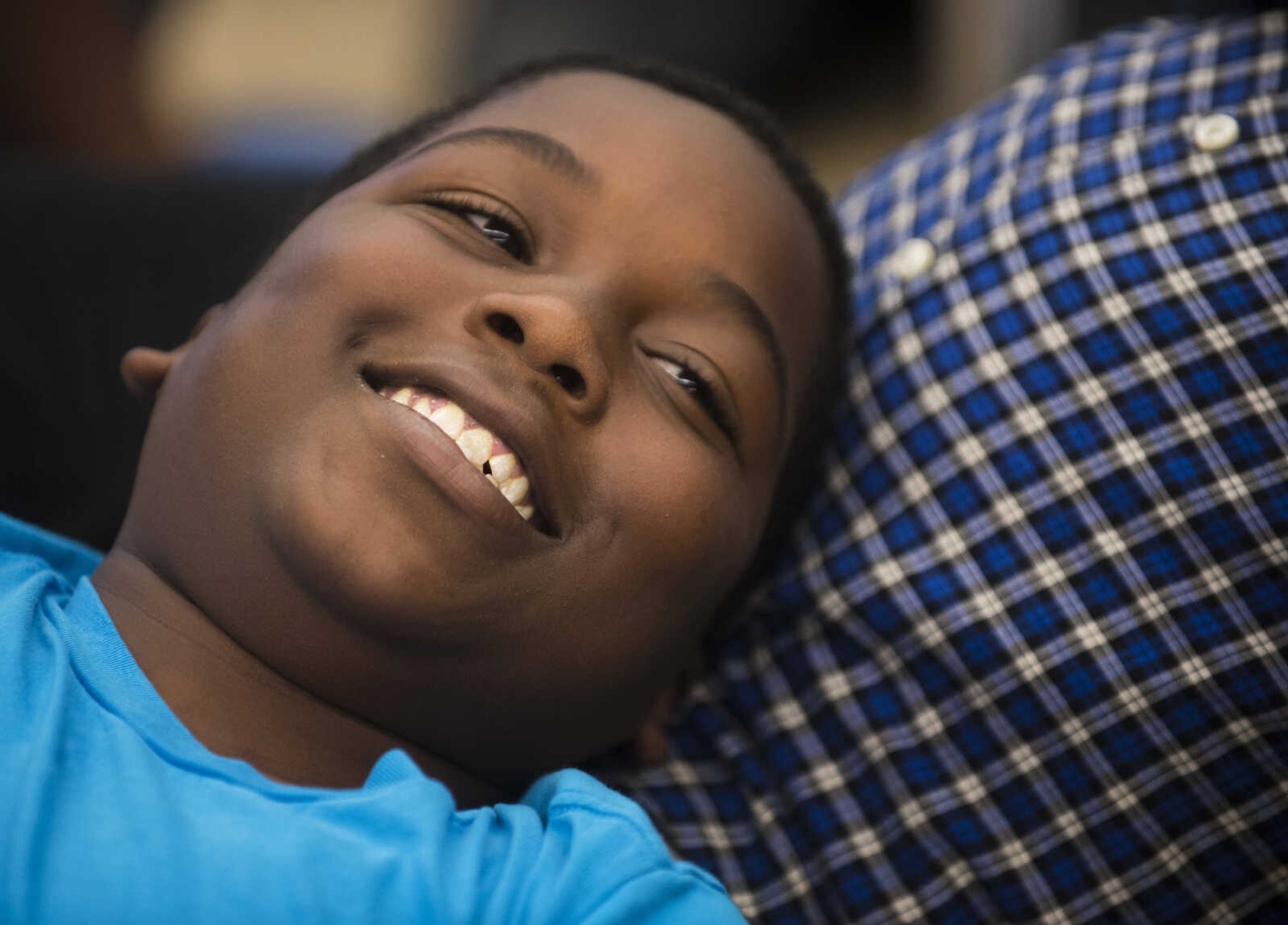 Hadrian Harris, 12, rests his head on Malachi Smith, 11, during a Honorable Young Men's Club team building exercise Sept. 19, 2017 at Central Middle School in Cape Girardeau.