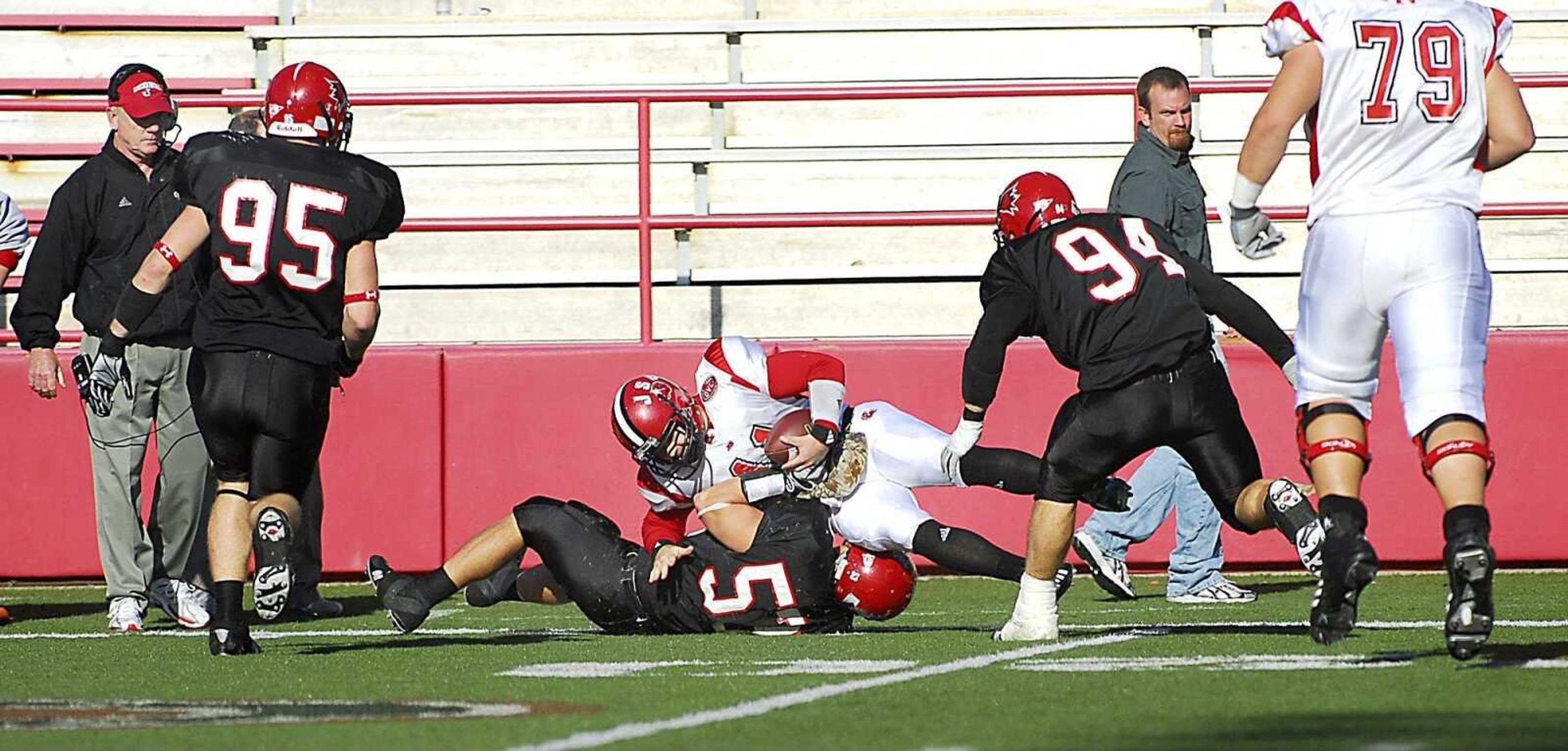 Southeast Missouri State linebacker Nick Stauffer, bottom, sacked Jacksonville State senior quarterback Matt Hardin Saturday afternoon, November 18, 2007, at Houck Stadium during the season finale. (Kit Doyle ~ kdoyle@semissourian.com)