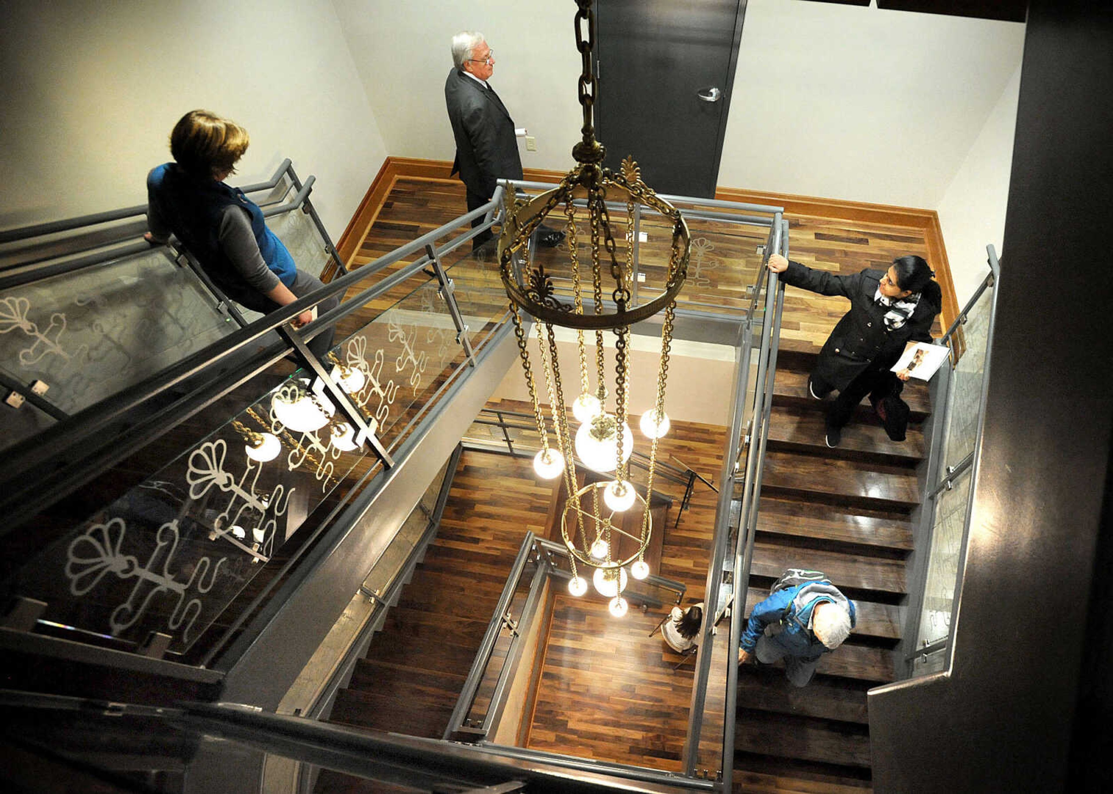 LAURA SIMON ~ lsimon@semissourian.com

Visitors take the stairs down to the third floor after viewing the inside of Academic Hall's dome, Thursday, Oct. 24, 2013, during the grand reopening ceremony of Southeast Missouri State University's Academic Hall.