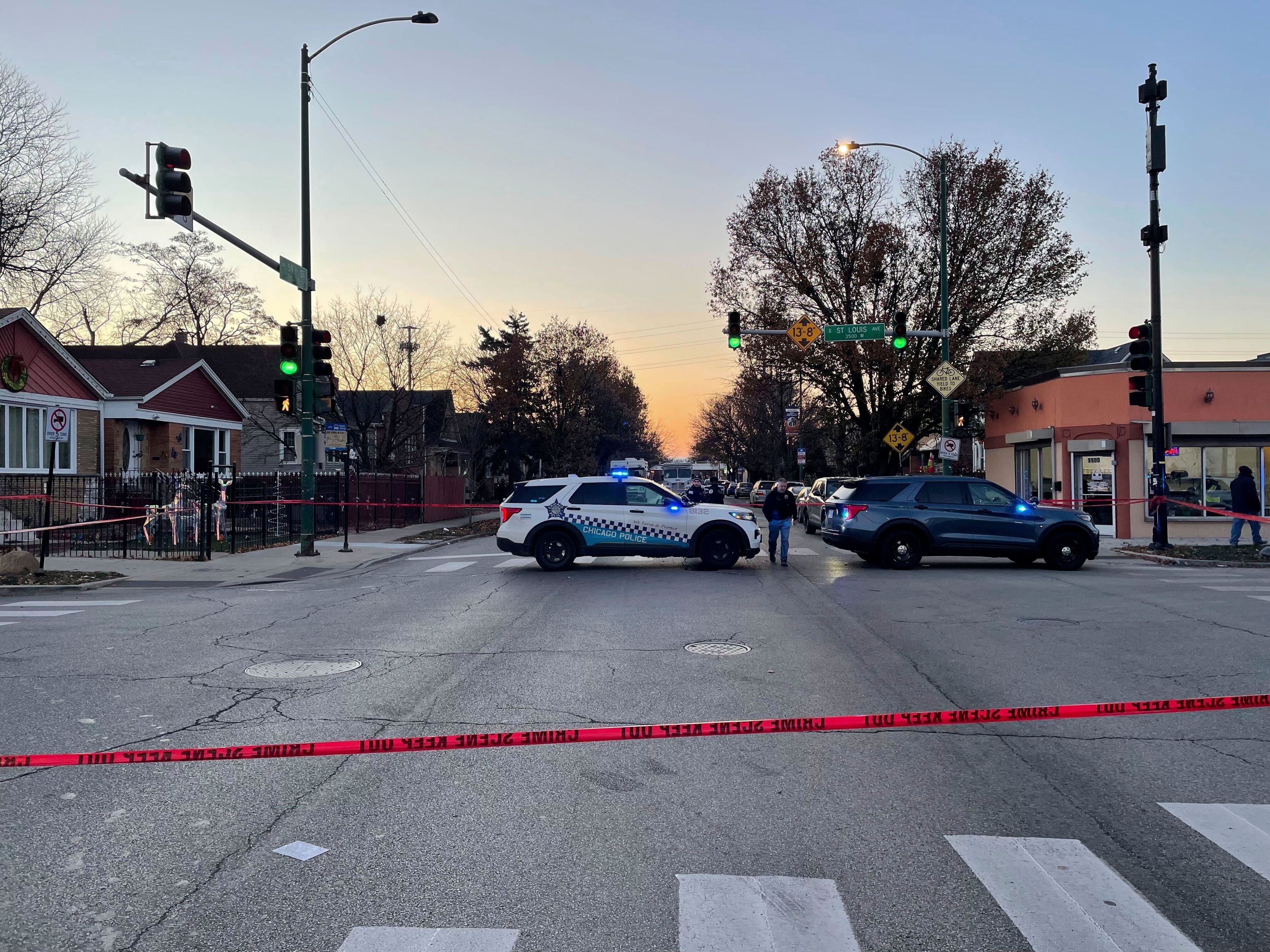 Police work on the scene after a shooting at a home in Chicago, Monday, Dec. 2, 2024. (David Struett/Chicago Sun-Times via AP)