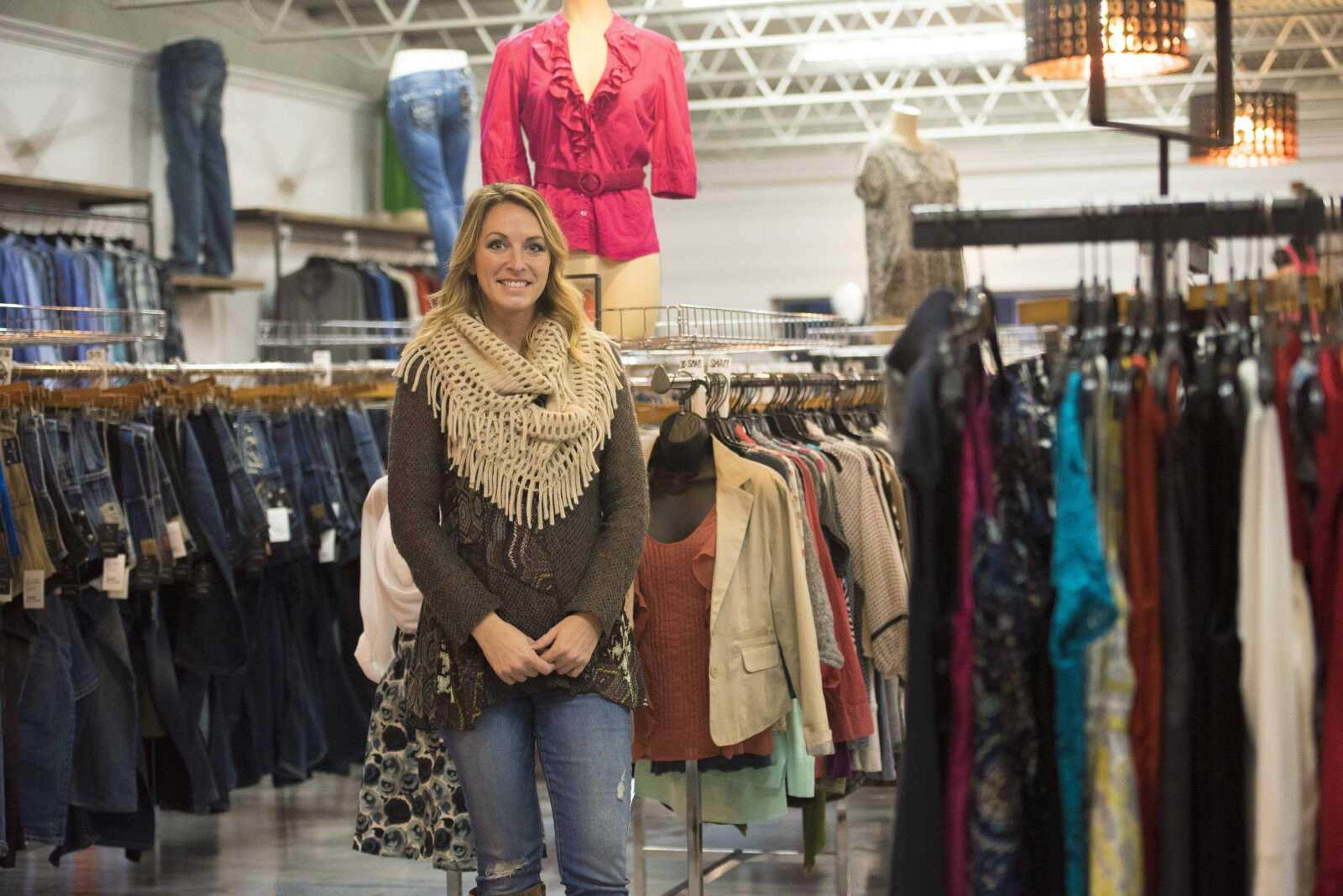 Amie Glass, owner of Cutting Edge Clothing, poses for a photo at her shop Friday in Jackson.