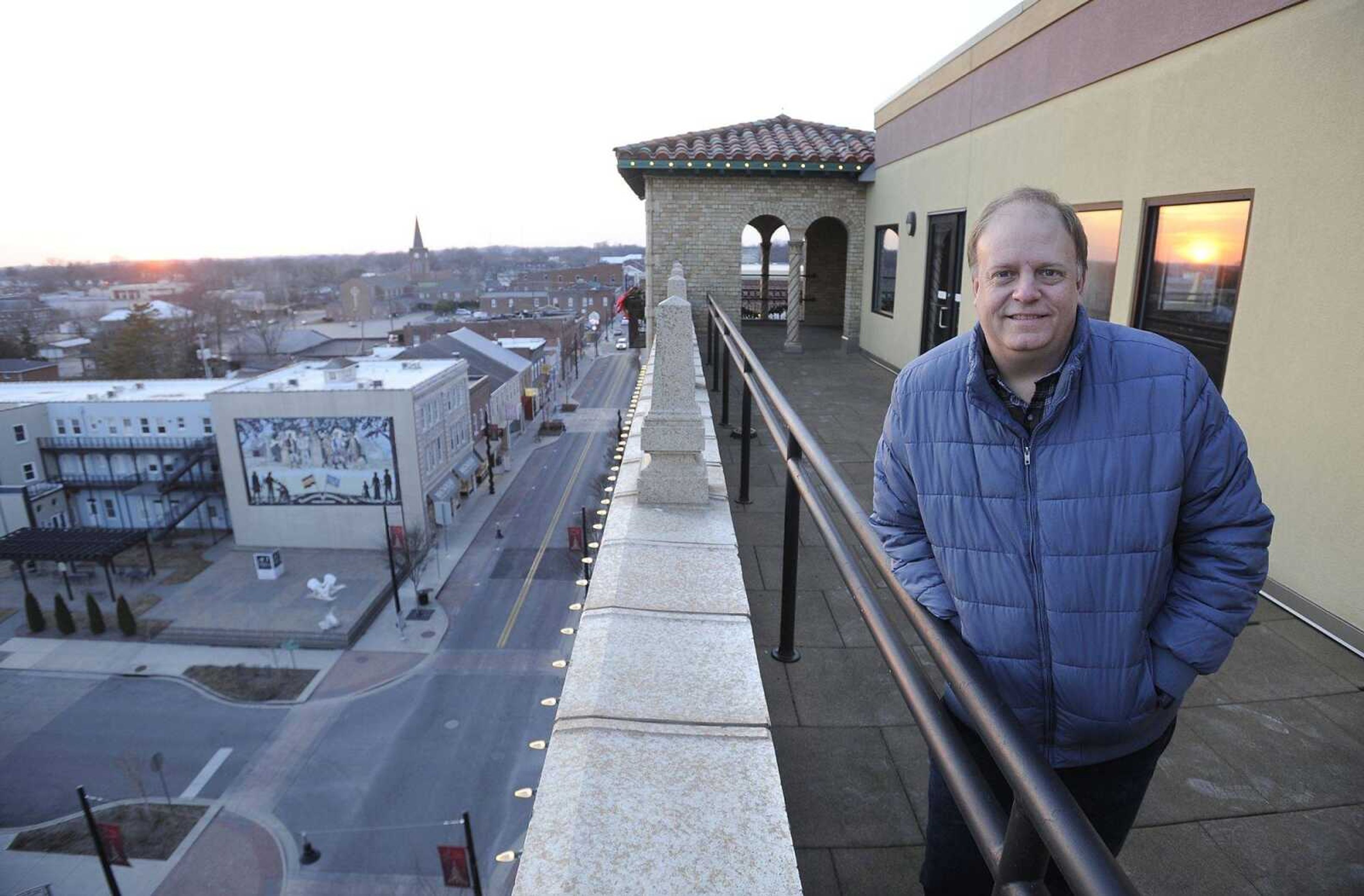 Keller Ford stands on the rooftop of Marquette Tower overlooking Broadway on Friday in downtown Cape Girardeau.