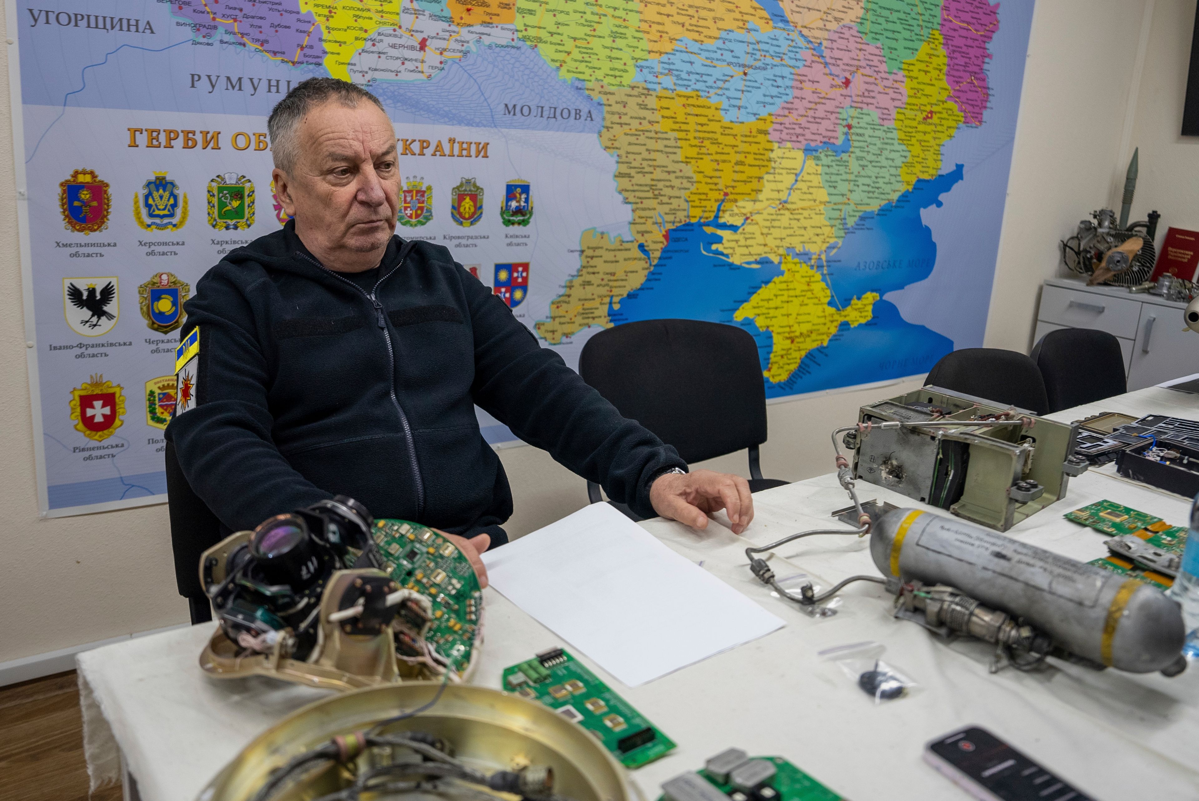 Andrii Kulchytskyi the head of the military research laboratory at the Kyiv Scientific Research Institute of Forensic Expertise sits in his workspace in Kyiv, Ukraine, Tuesday, Oct. 15, 2024. (AP Photo/Alex Babenko)