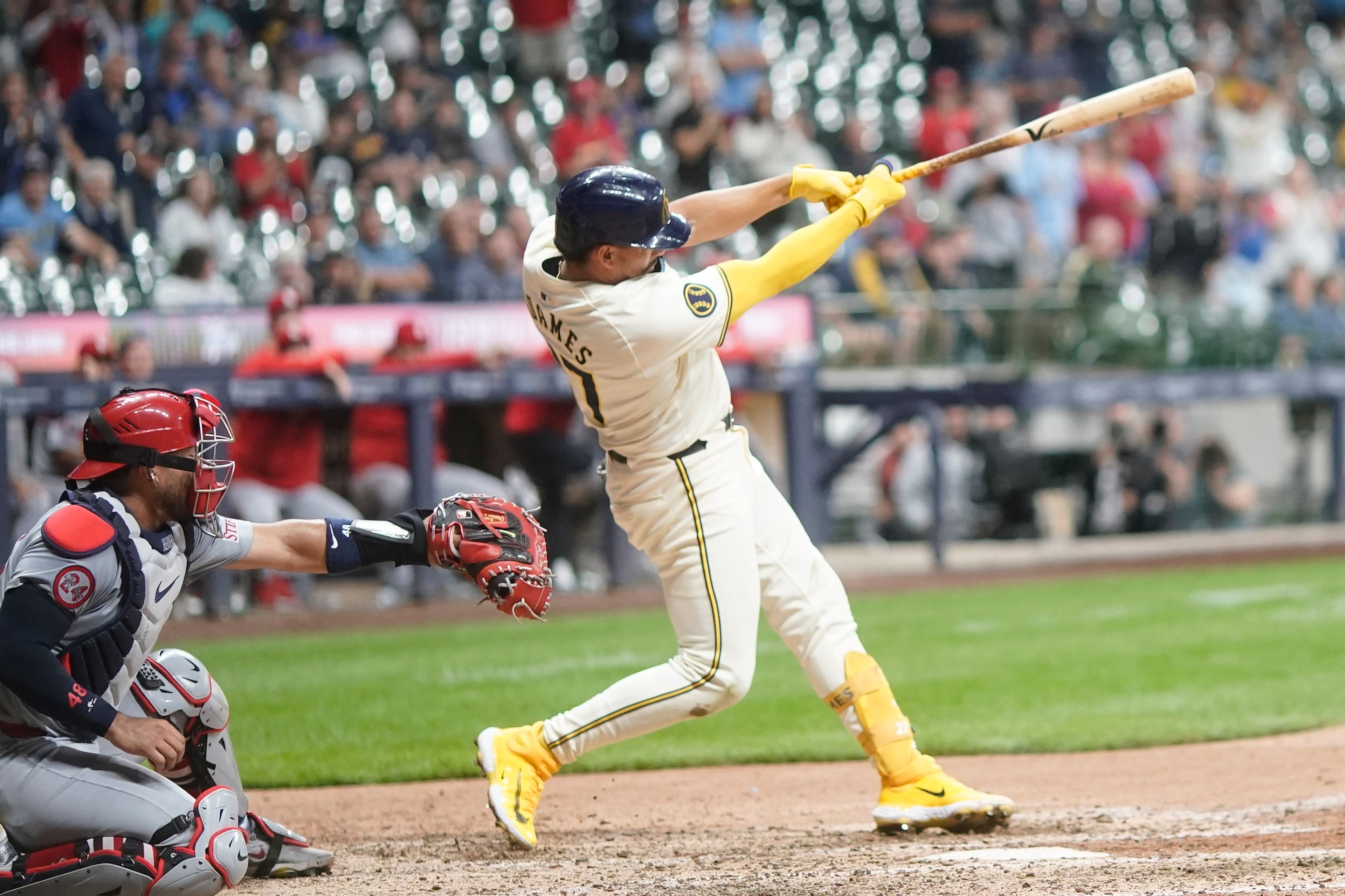 Milwaukee Brewers' Willy Adames hits an RBI double during the 11th inning of a baseball game against the St. Louis Cardinals Tuesday, Sept. 3, 2024, in Milwaukee. (AP Photo/Morry Gash)