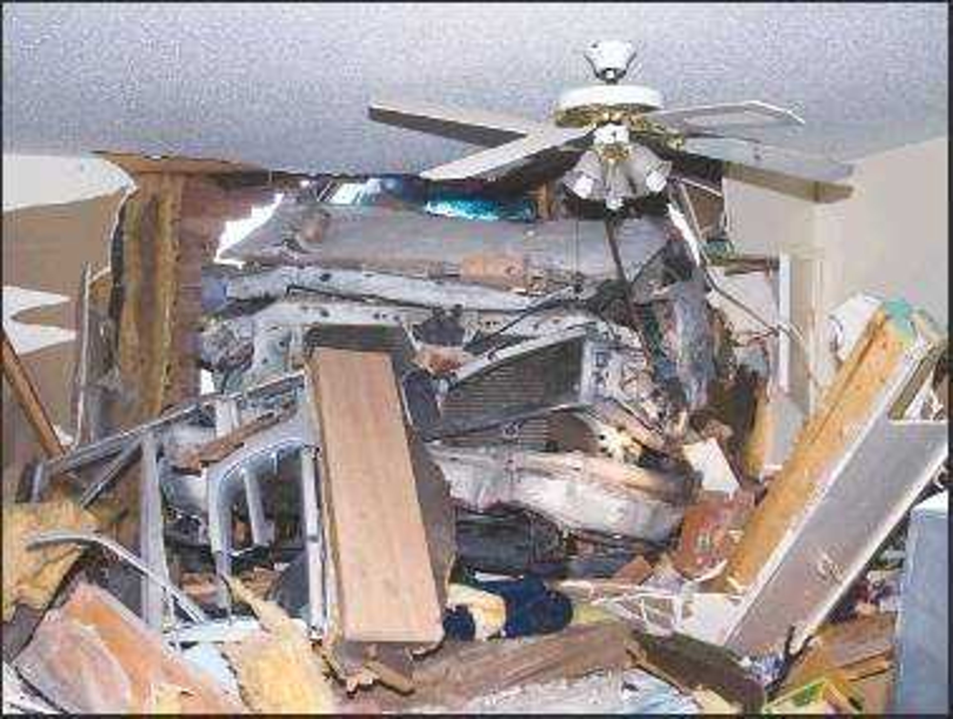 Shown are the damages to a bedroom where a woman was sleeping when a 1999 Ford pickup crashed through the wall Thursday. (Daily American Republic/Corey Matthews)