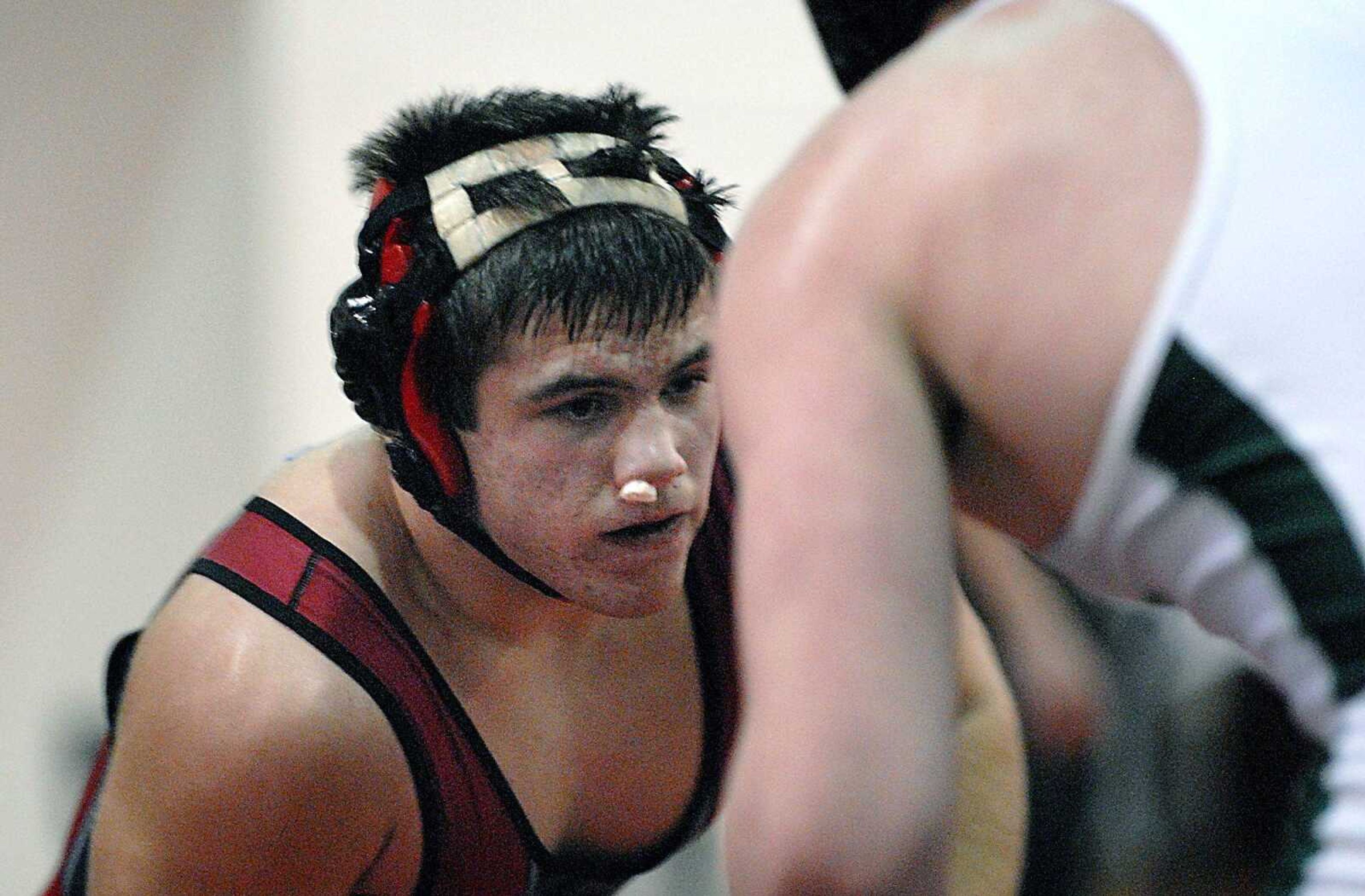 Jackson's Michael Riney, left, lost to DeSoto's Jeremy Elless in their 189-pound fifth-place match at the Tiger Classic on Saturday. (Kit Doyle)