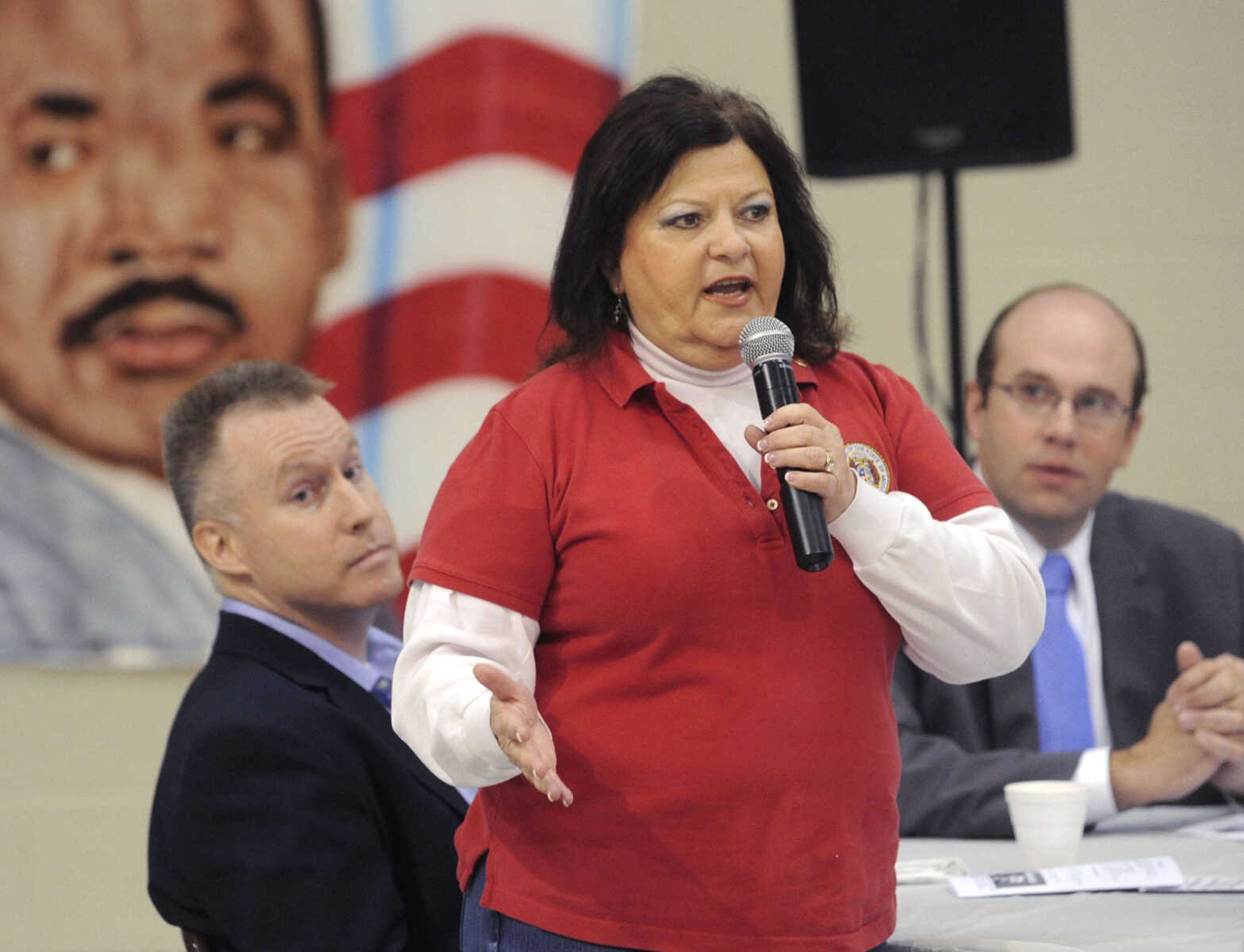 FRED LYNCH ~ flynch@semissourian.com
State rep. Donna Lichtenegger speaks at the Dr. Martin Luther King Jr. Memorial Breakfast, as city councilman Dr. Wayne Bowen, left, and U.S. Rep. Jason Smith listen, Monday, Jan. 19, 2015 at the Salvation Army in Cape Girardeau.