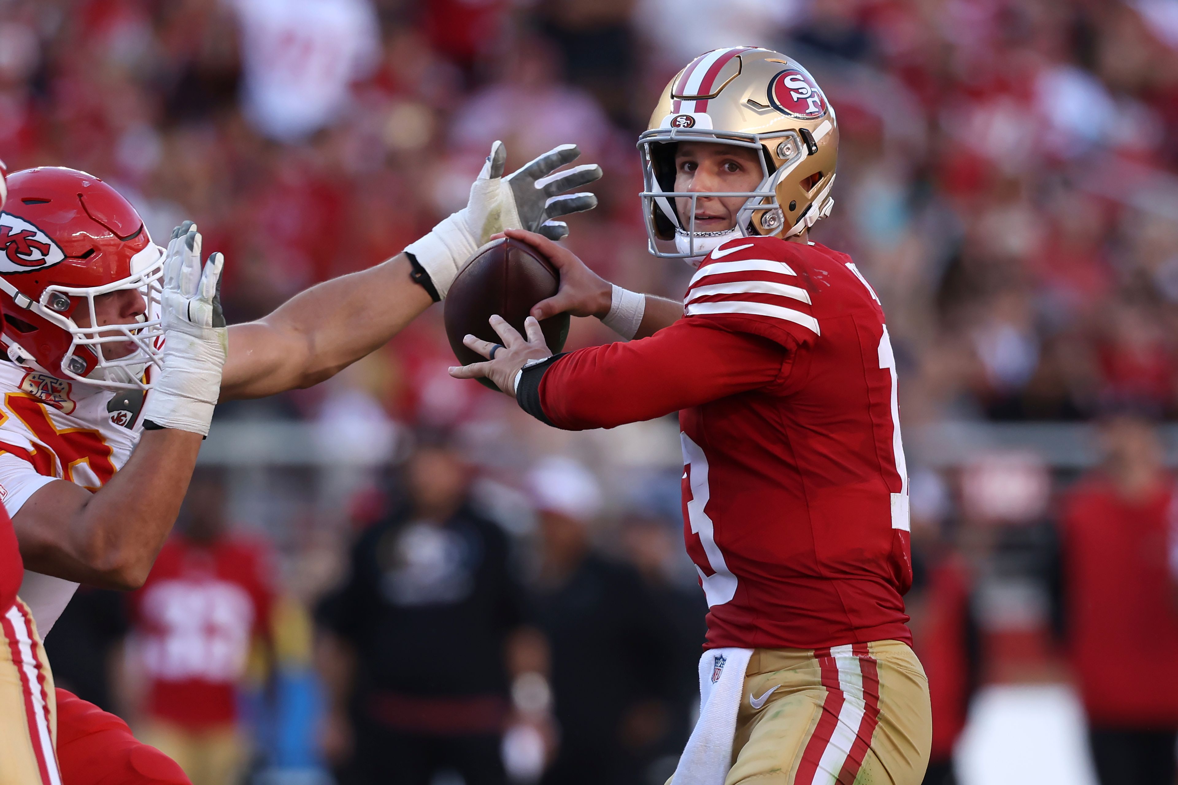 San Francisco 49ers quarterback Brock Purdy (13) passes against the Kansas City Chiefs during the second half of an NFL football game in Santa Clara, Calif., Sunday, Oct. 20, 2024. (AP Photo/Jed Jacobsohn)