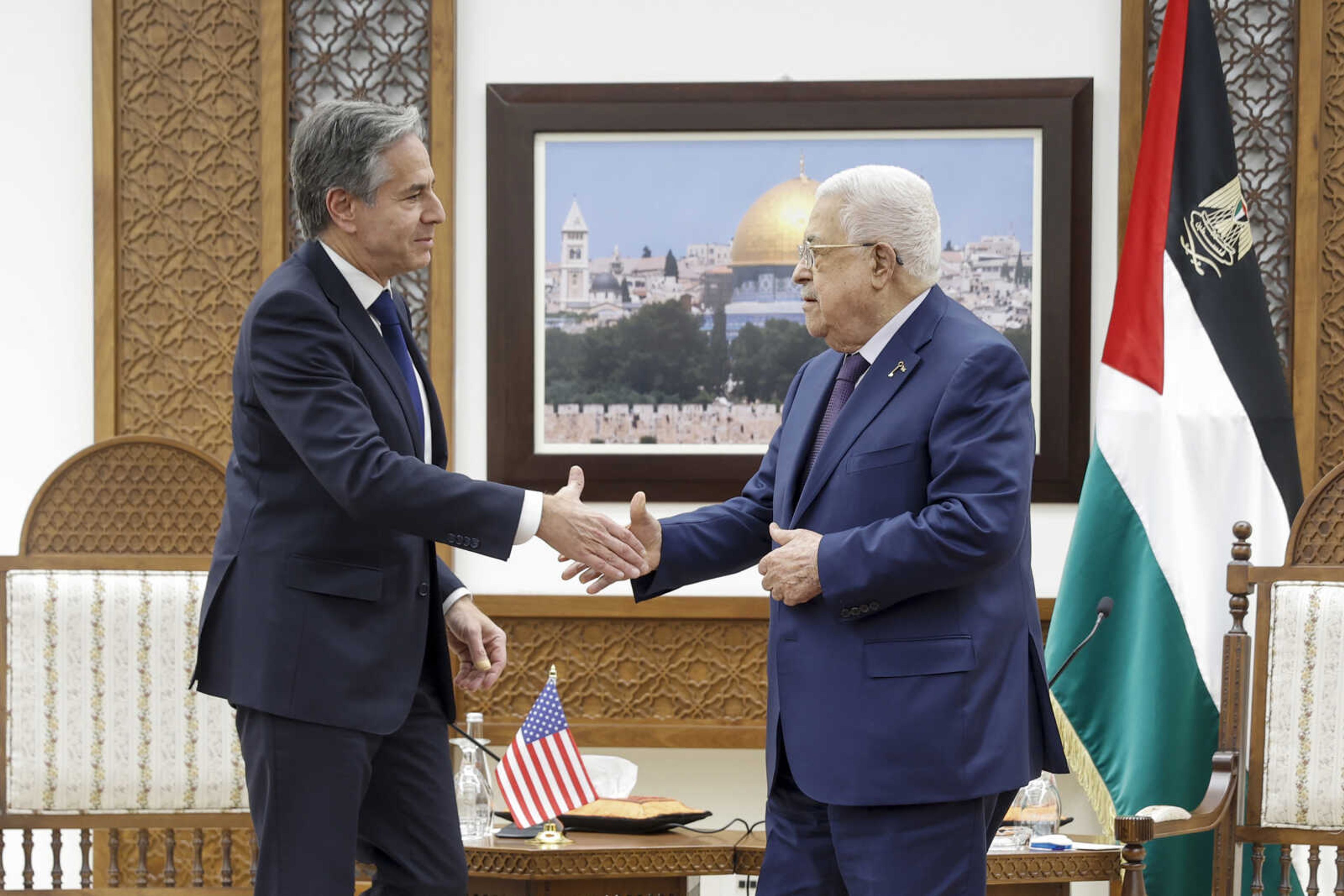 U.S. Secretary of State Antony Blinken meets with Palestinian President Mahmoud Abbas amid the ongoing conflict between Israel and the Palestinian Islamist group Hamas, on Sunday at the Muqata in Ramallah in the Israeli-occupied West Bank.