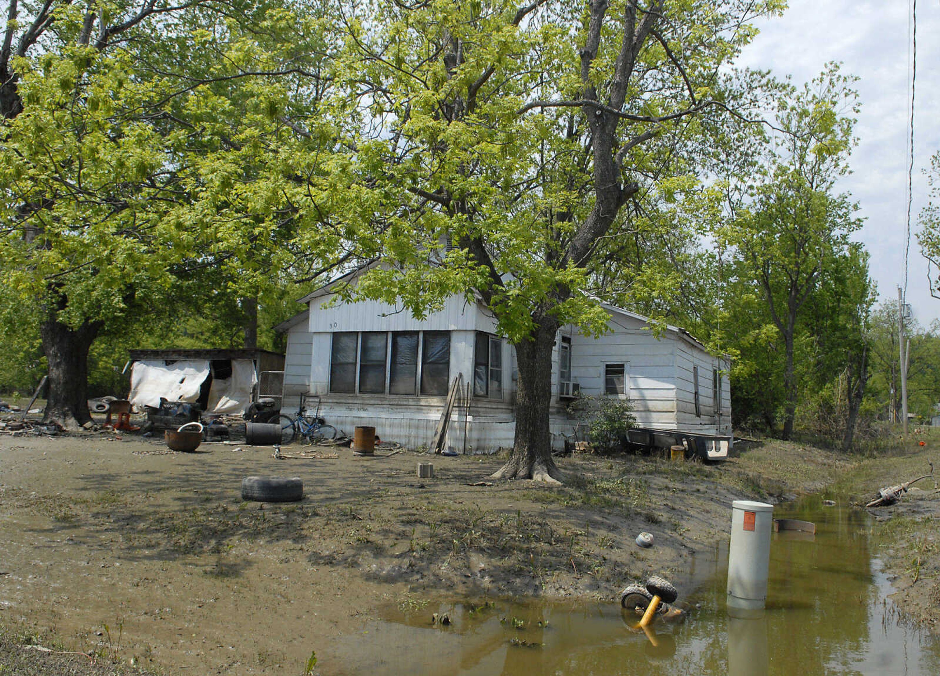 KRISTIN EBERTS ~ keberts@semissourian.com

Evidence of flooding can still be seen as waters recede in Commerce, Mo., on Tuesday, May 10, 2011.