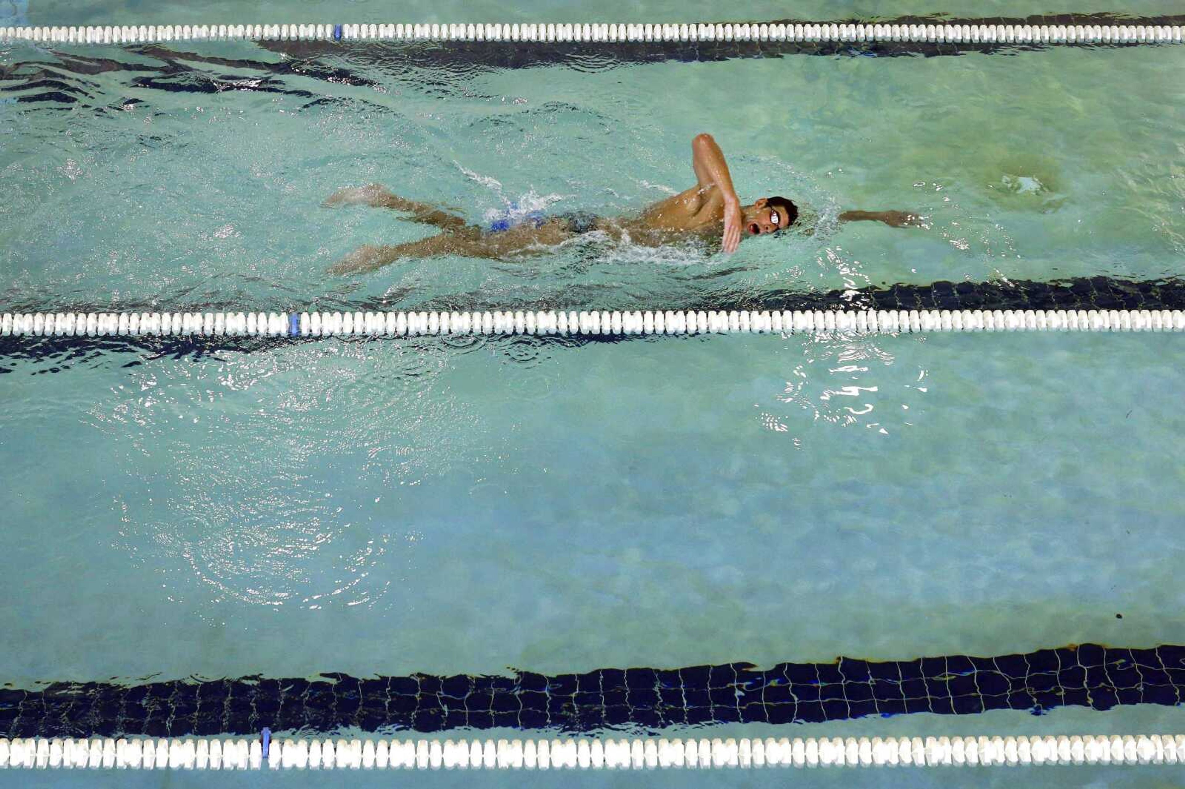 Michael Phelps swims at Meadowbrook Aquatic and Fitness Center on Thursday in Baltimore. It is where Phelps put in most of the work to become the most decorated athlete in Olympic history and where he&#8217;s looking to add to that legacy after an aborted retirement, his eyes firmly on the Rio Games two years away. (Patrick Semansky ~ Associated Press)