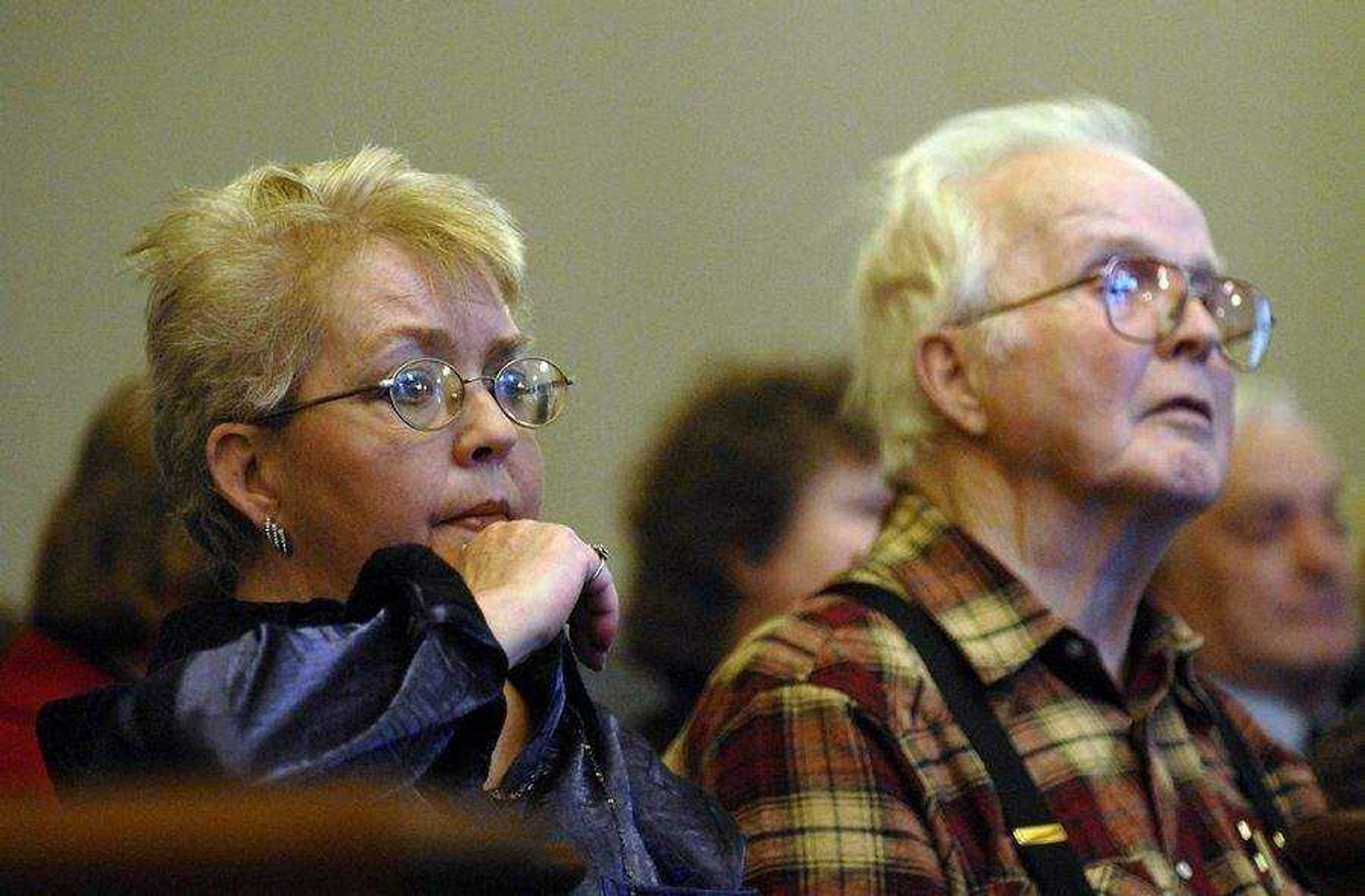 ELIZABETH DODD ~ edodd@semissourian.com<br>Joan Kezer, Joshua Kezer's mother, left and Hadley James, Kezer's grandfather, listen to witness testimony on the first day of the hearing Dec. 2 in Cole County.