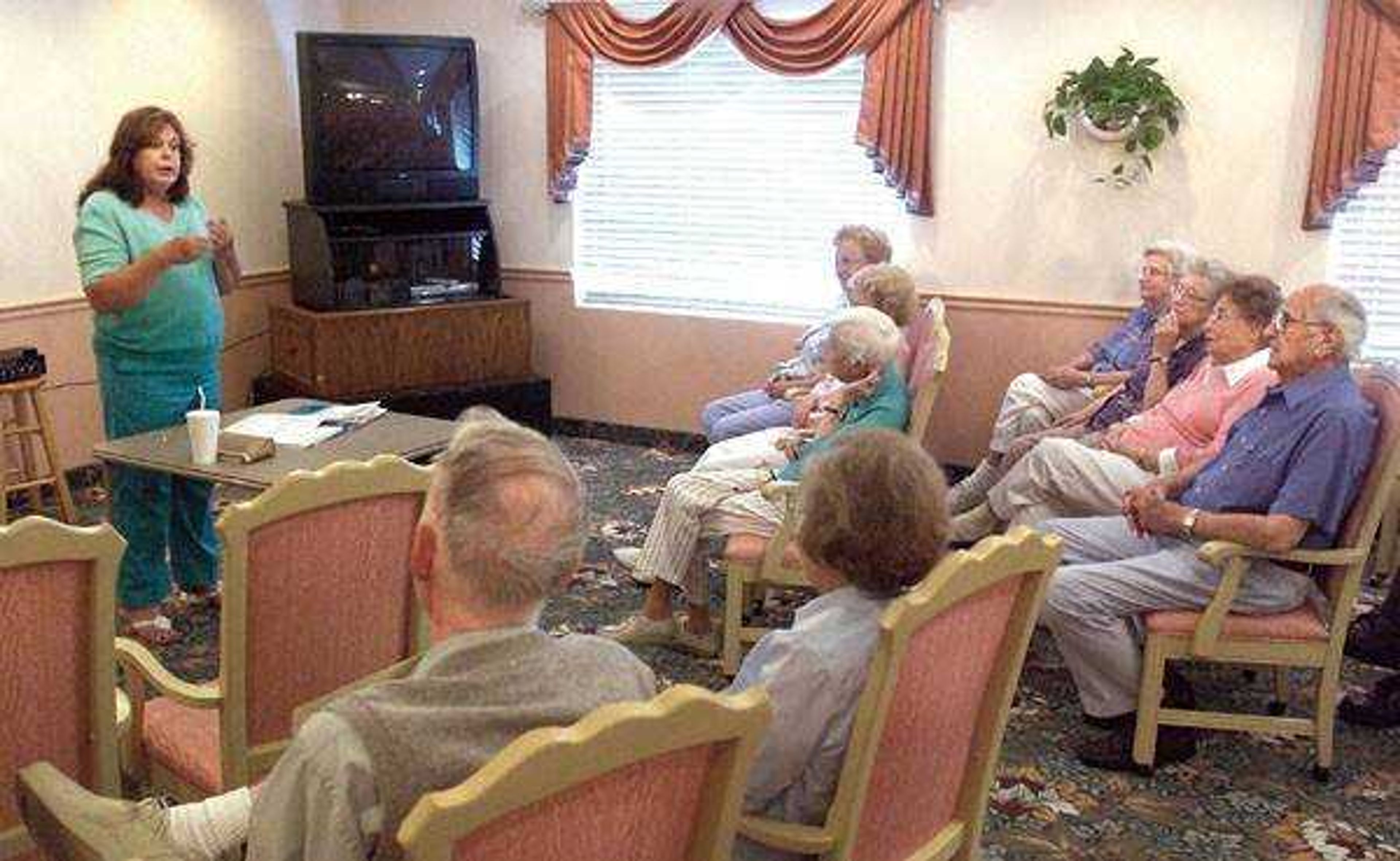 Glenna J. Wallace spoke to residents of Chateau Girardeau on Tuesday about her portrayal of Mary Elizabeth Lease, a political activist, for the Chautauqua event.