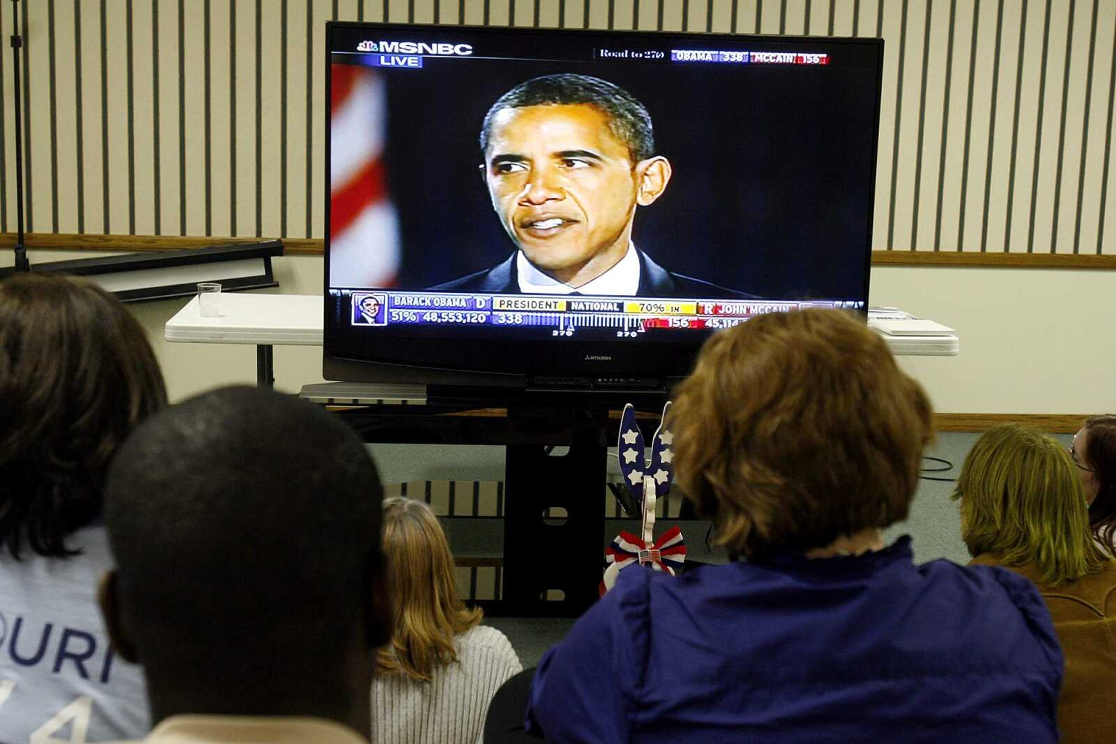 ELIZABETH DODD ~ edodd@semissourian.com
Many Obama supporters hang out at the Elks Lodge to view Obama's acceptance speech.