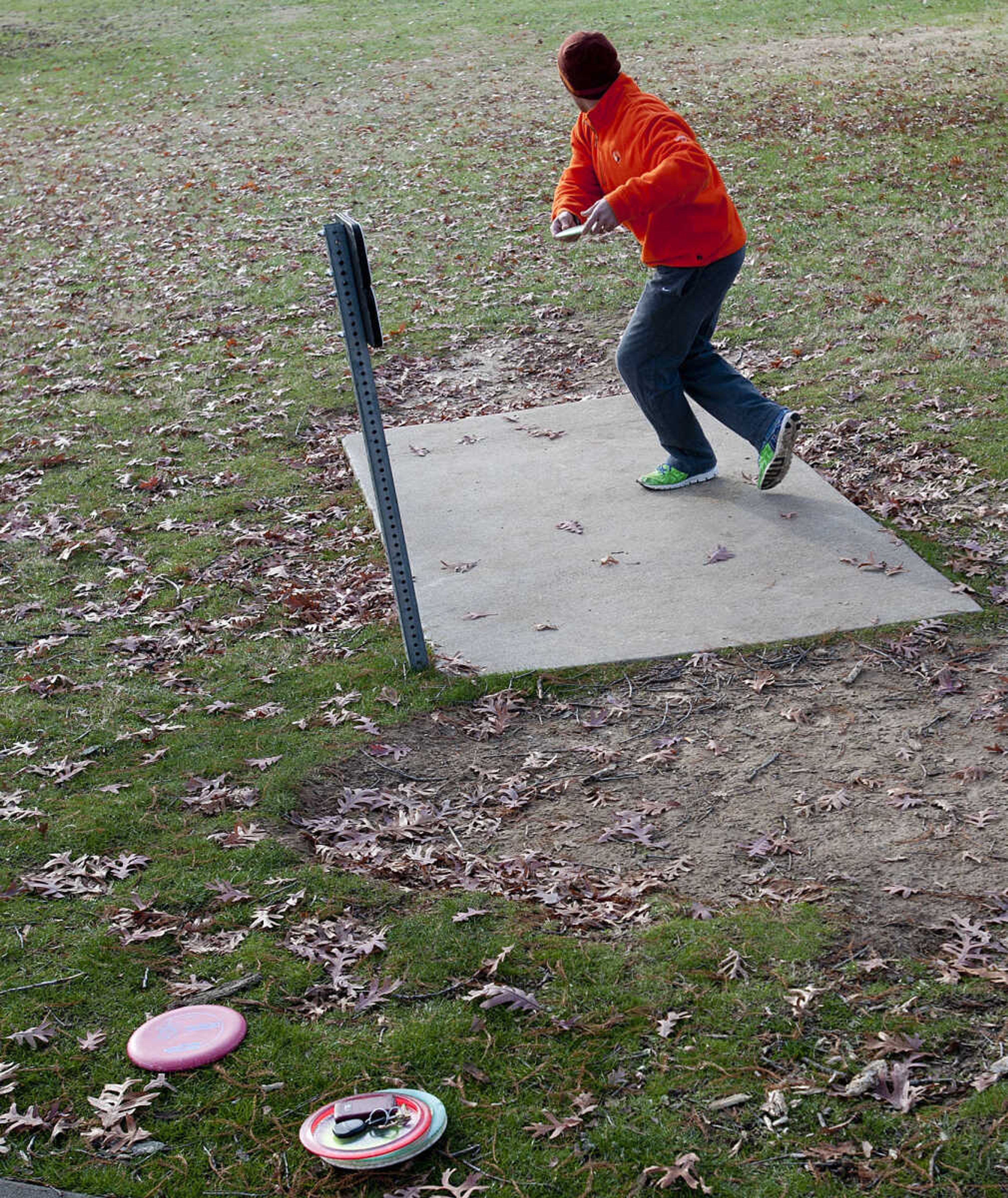 Stan Seabaugh hits his tee shot during the Fountain of Life Disc Golf Tournament Sunday, Nov. 24, at Capaha Park in Cape Girardeau. Organizers estimated that approximately 30 people played in the tournament which raised around $2,500 which will go towards construction of a fresh water well for a village in Swaziland, Africa.