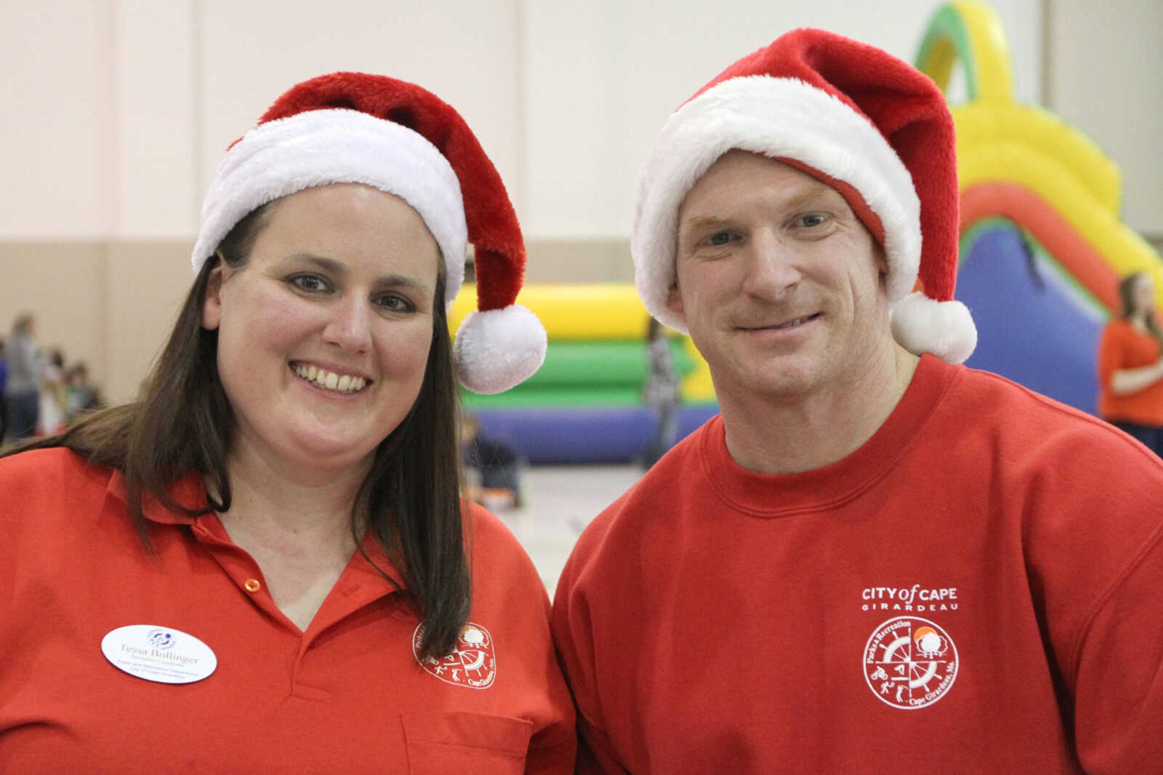 GLENN LANDBERG ~ glandberg@semissourian.com

Tessa Bollinger and Chris Eastridge pose for a photo during a breakfast with Santa fundraiser for the Cape Girardeau Parks and Recreation Foundation Saturday, Dec. 13, 2014 at the Osage Centre.