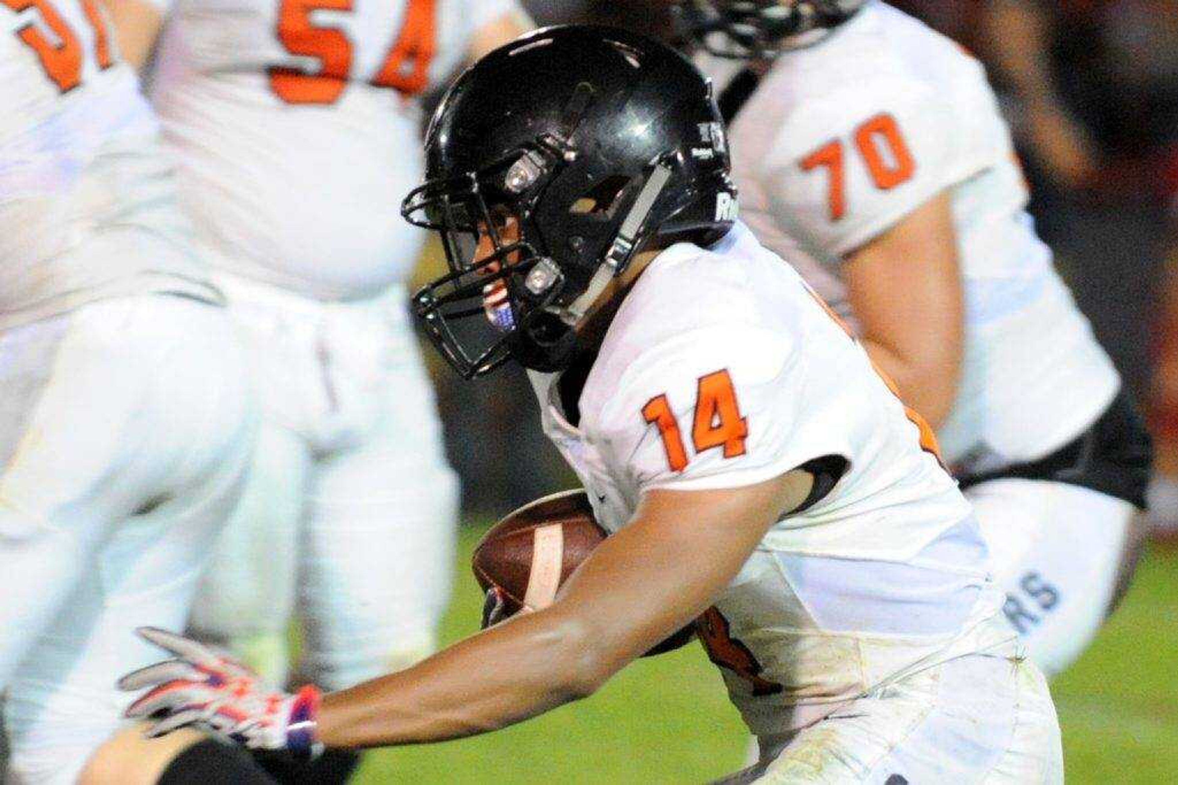 Cape Central's Joe Baker carries the ball against Liberty on Friday, Aug. 19, 2016 in Mountain View, Missouri.