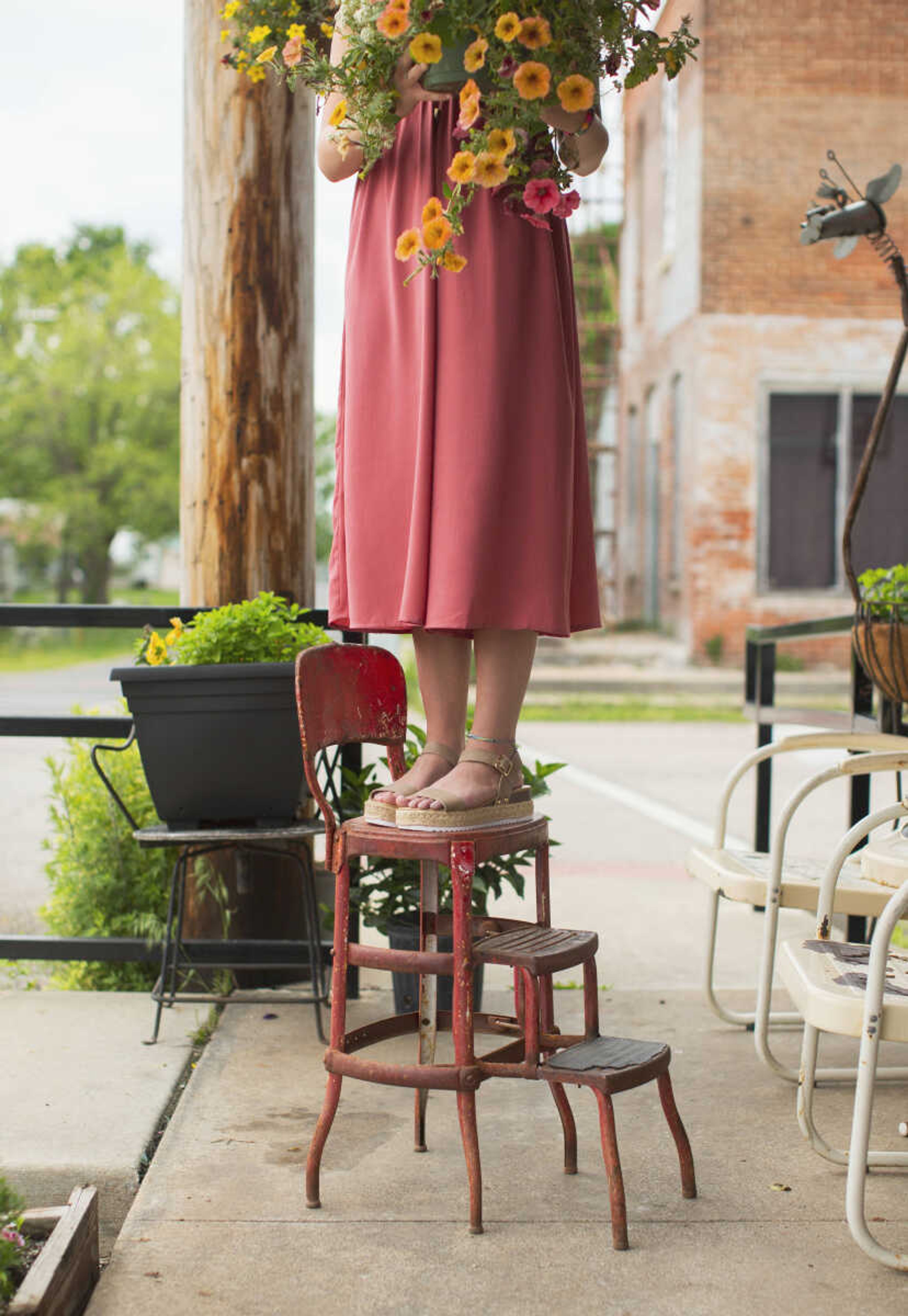 Emily Sachs models clothes, shoes and jewelry from Jenny May Boutique in Cape Girardeau.