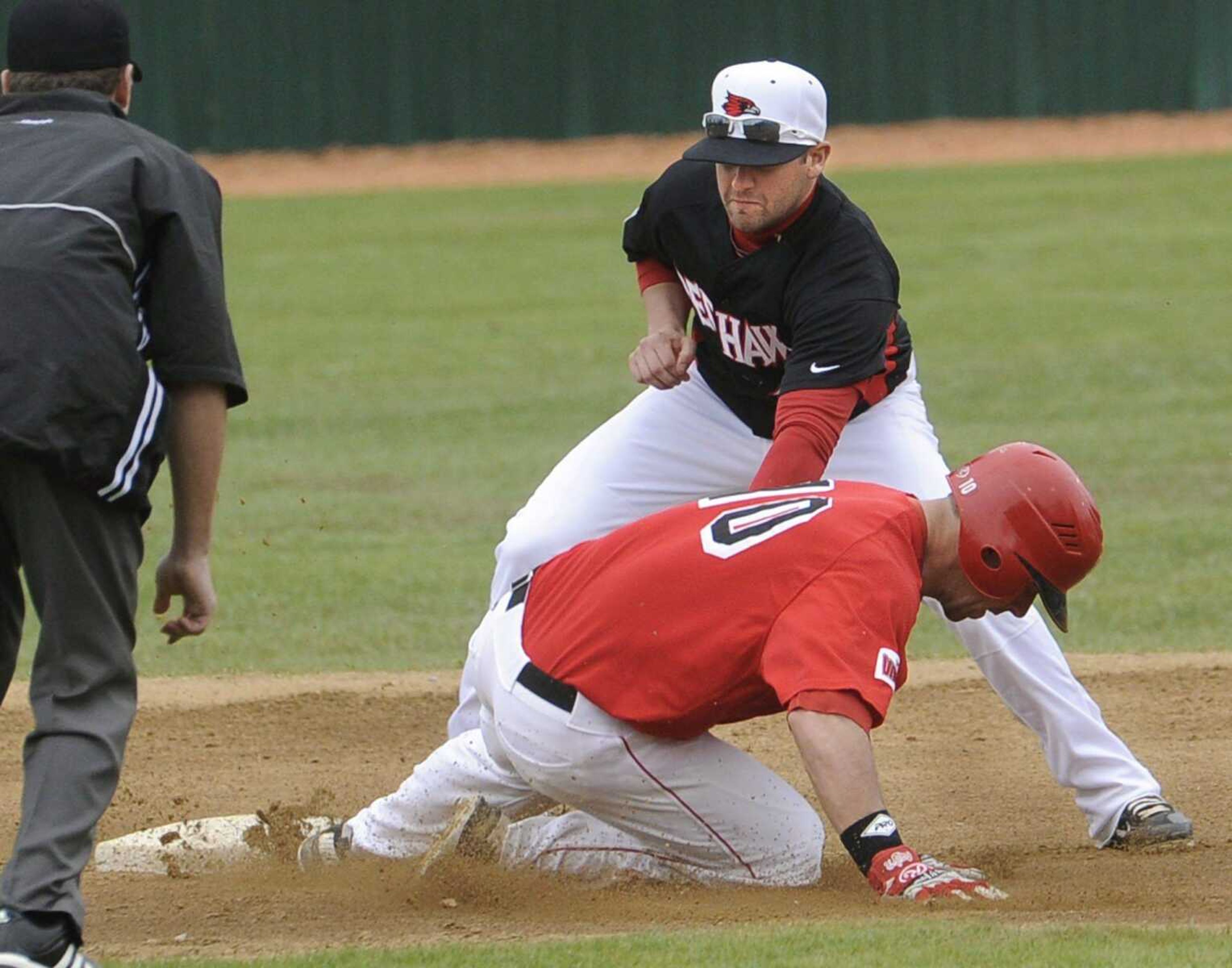 Southeast Missouri State second baseman Taylor Heon tags out Illinois State&#8217;s Ty Wiesemeyer on a steal attempt during the first inning Sunday at Capaha Field. (Fred Lynch)