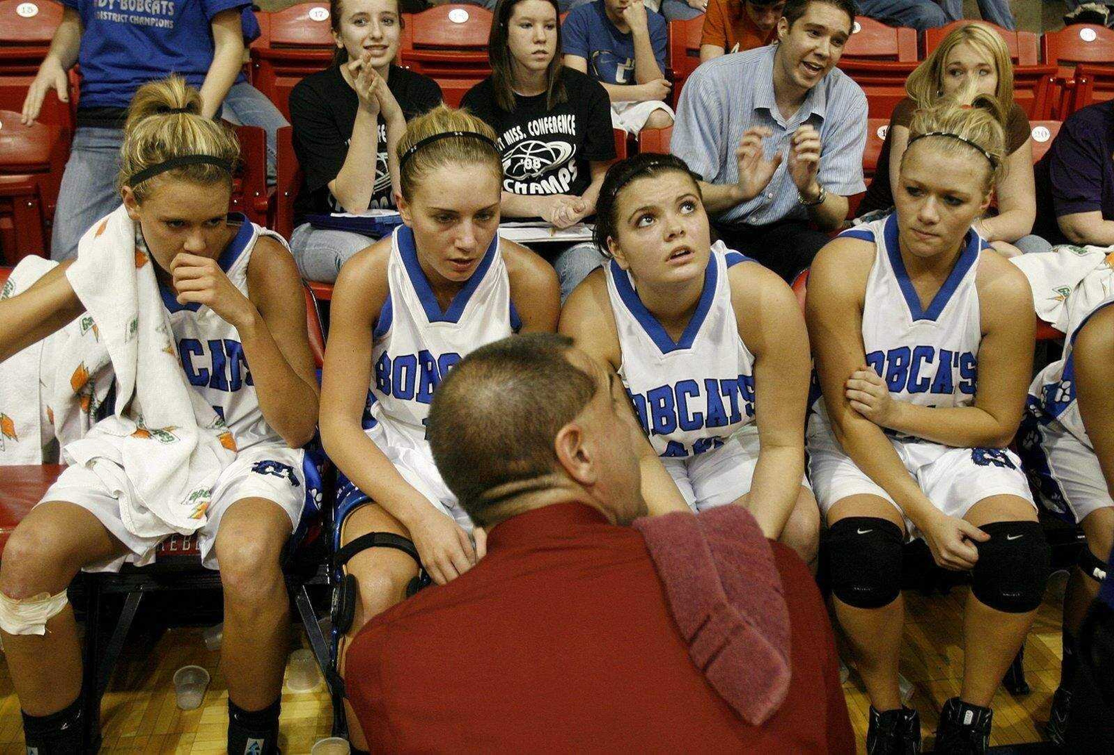 ELIZABETH DODD ~ edodd@semissourian.comDelta's Jodi Menz, left, Taylor Smith, Courtney Burton and Kendra Burnett sit for the final timeout in the final seconds of the game that ended with a Delta victory 43-40 in the Class 1 girls tournament Tuesday at Central in Park Hills.