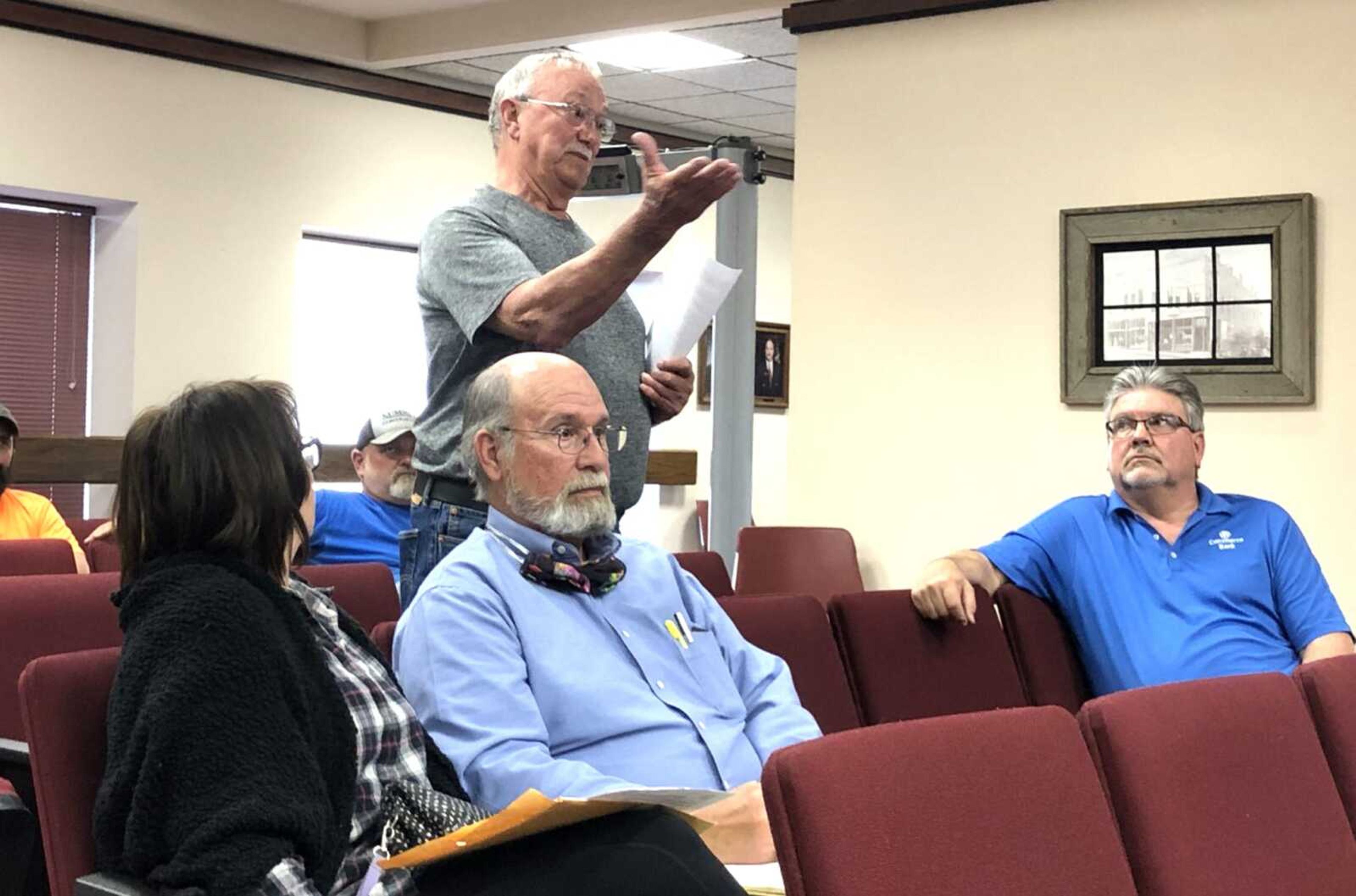 John King Jr., standing, addresses the Jackson Board of Aldermen on Monday to express his concerns about rezoning of property near his home along Ridge Road on the east side of Jackson. The aldermen approved the rezoning by a vote of 6-1.