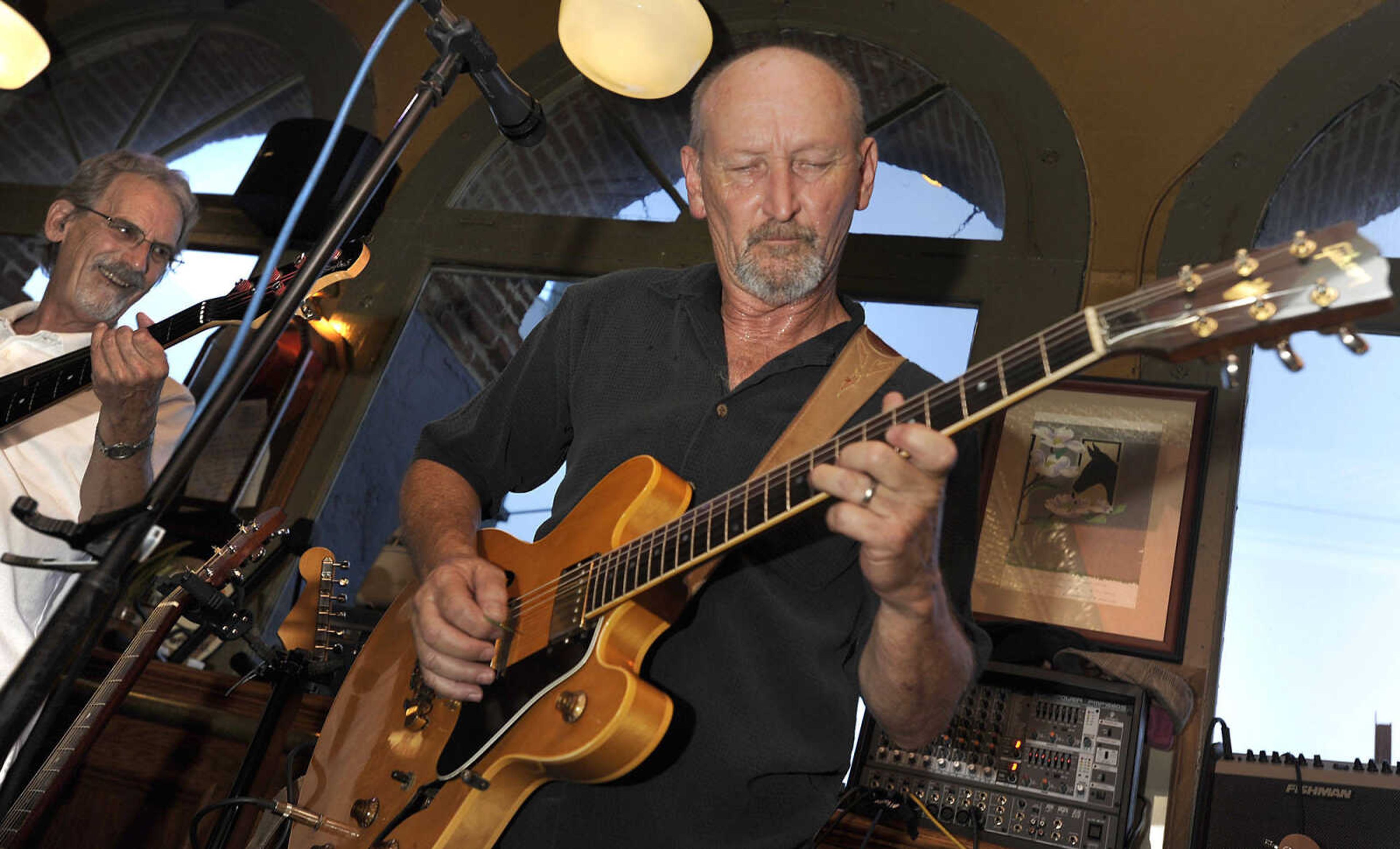 FRED LYNCH ~ flynch@semissourian.com
Bruce Zimmerman plays blues with the Water Street Band at the final Sunday night music session at Port Cape Girardeau Sunday, July 12, 2015 in Cape Girardeau.