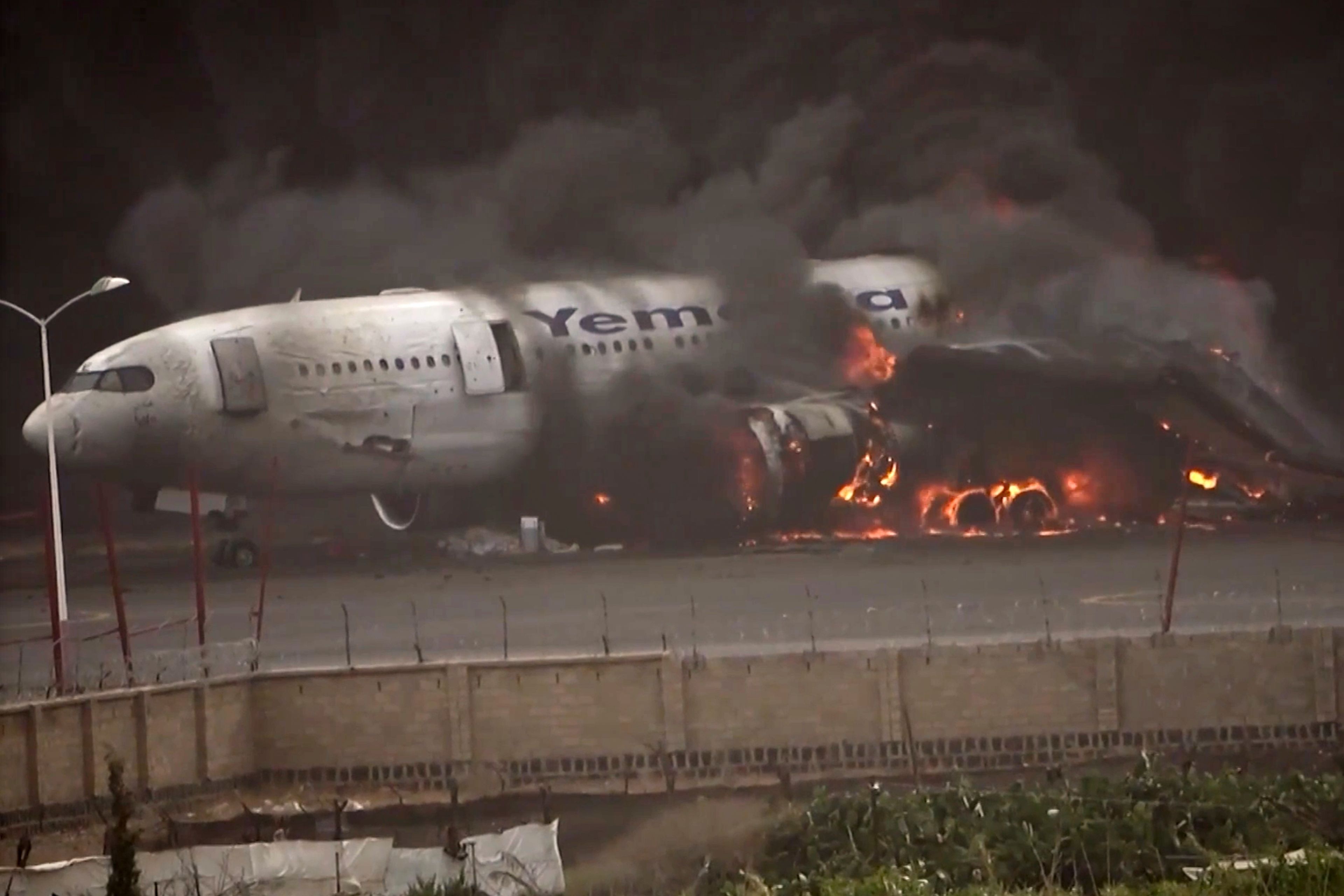 Fighter jet goes overboard from USS Harry S Truman. Yemen's Houthis assess Sanaa airport damage
