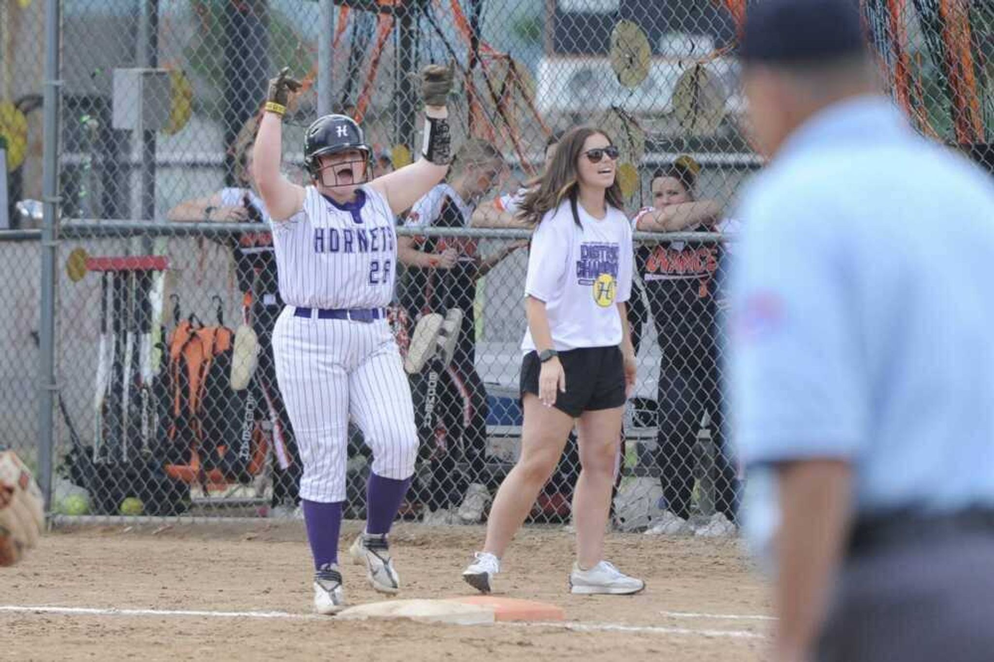 Holcomb Lady Hornet slugger Jasmine White celebrates.