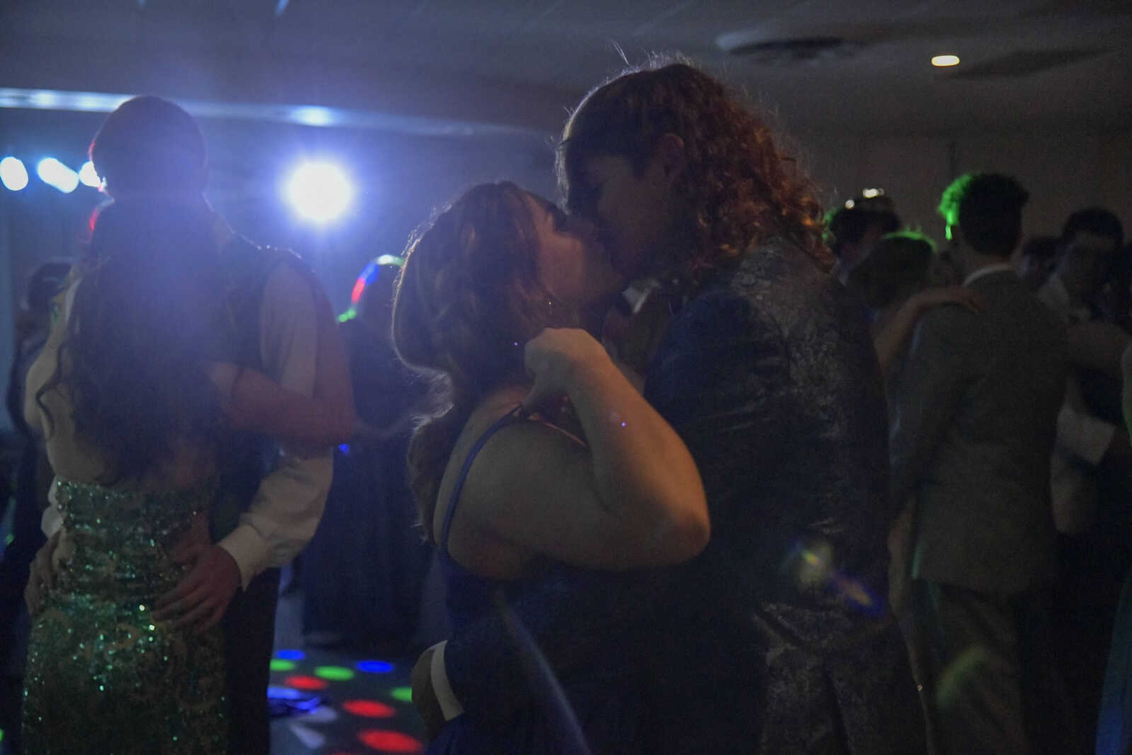 Lauren Bradford and Dayton Gentry kiss during a slow dance at the Front Porch in Scott City on Saturday, April 24, 2021.