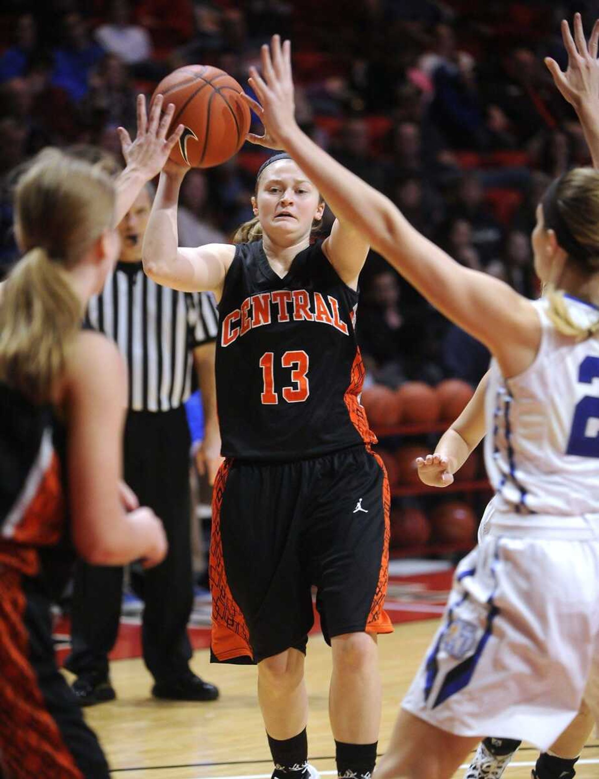 Cape Central's Katelyn May looks to pass against Notre Dame during the first quarter in a first-round game of the Kelso Supply Holiday Classic Sunday, Dec. 20, 2015 at the Show Me Center. (Fred Lynch)